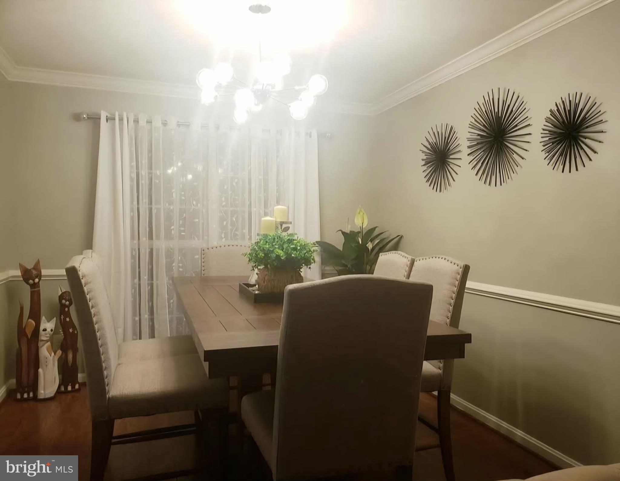 8113 Alan Tree Road Rosedale, MD 21237 - Photo 4 of 13 a view of a room with furniture and a potted plant
