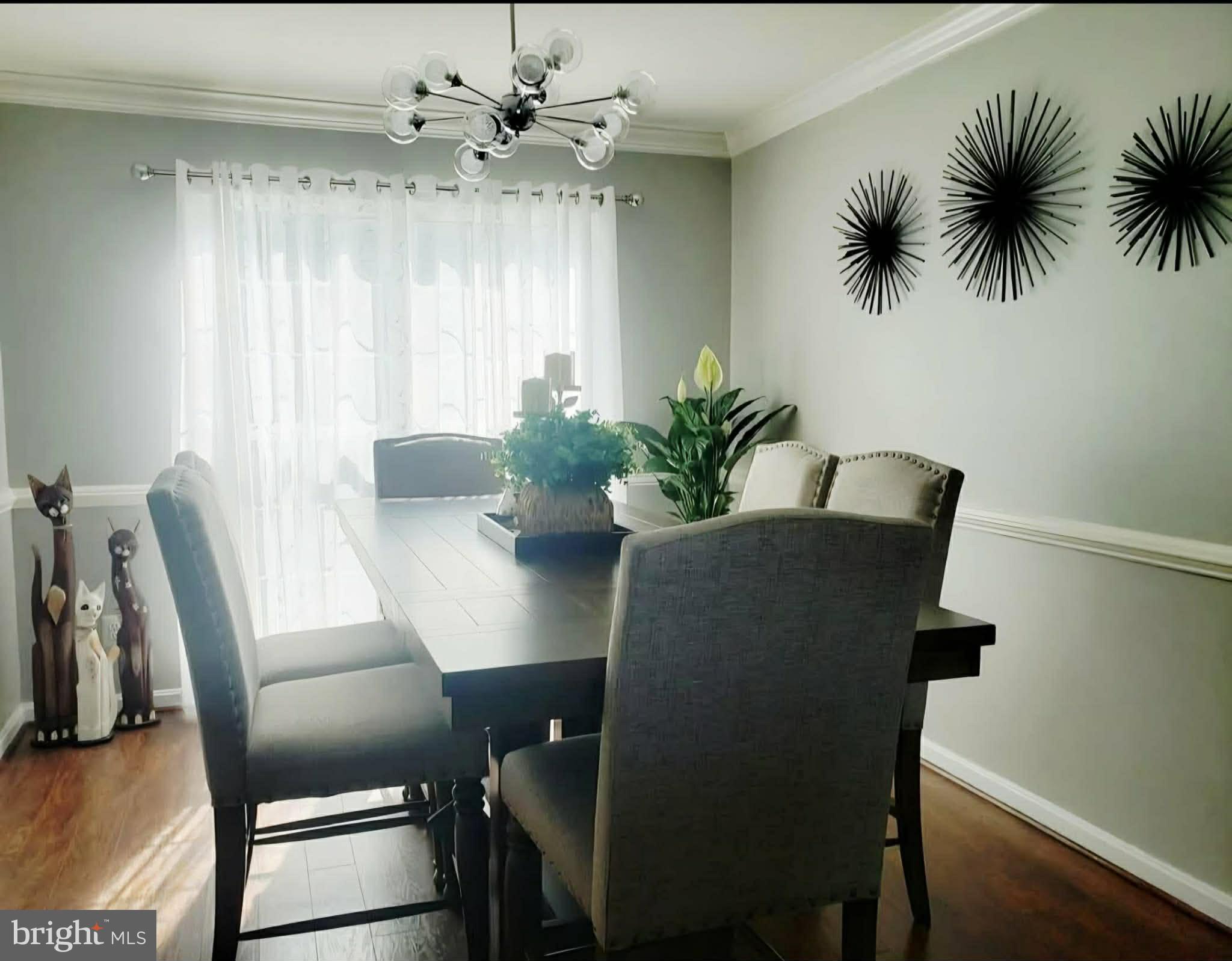 8113 Alan Tree Road Rosedale, MD 21237 - Photo 5 of 13 a view of a dining room with furniture and window