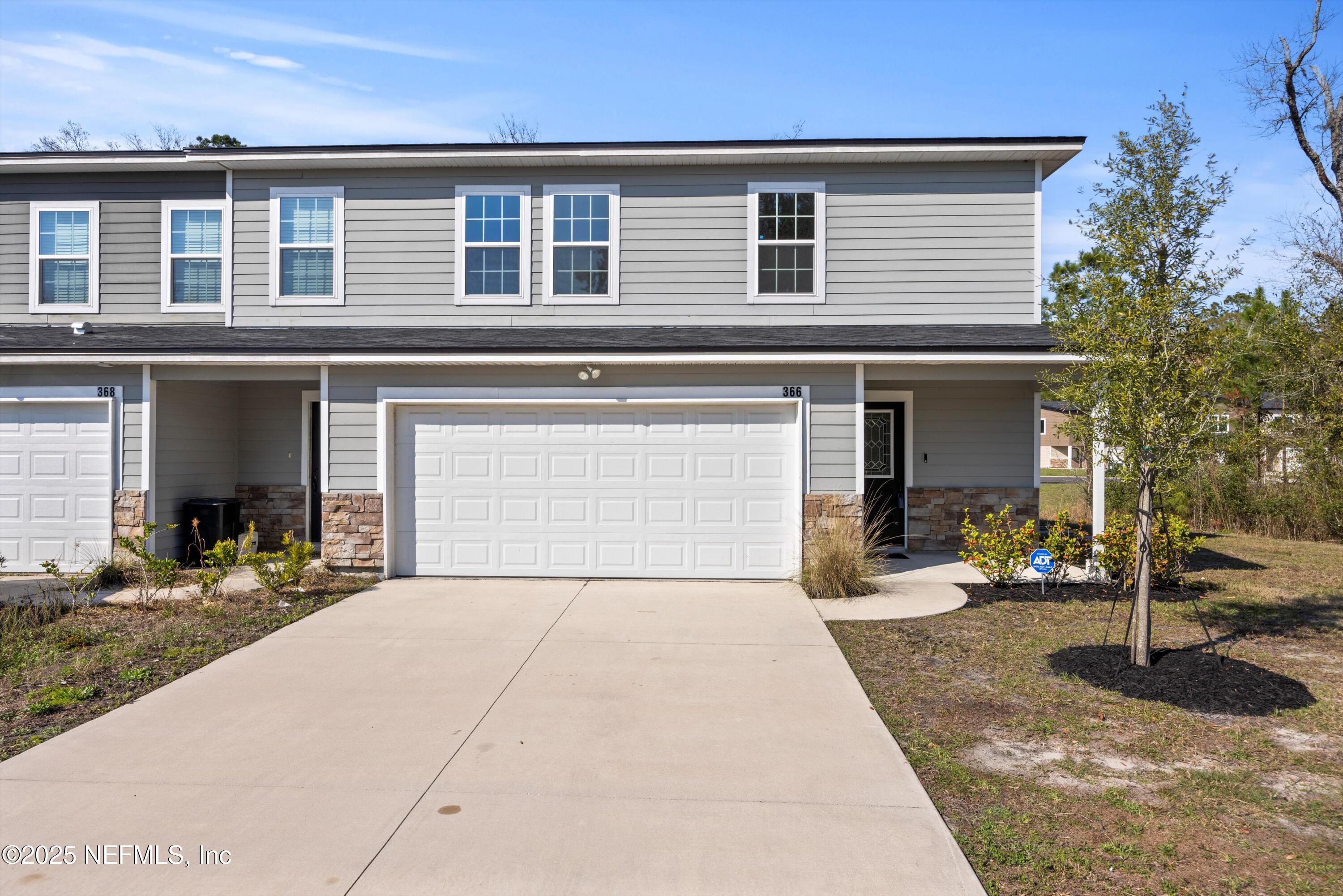 366 Old Jennings Road Orange Park, FL 32065 - Photo 2 of 40 a front view of a house with garden