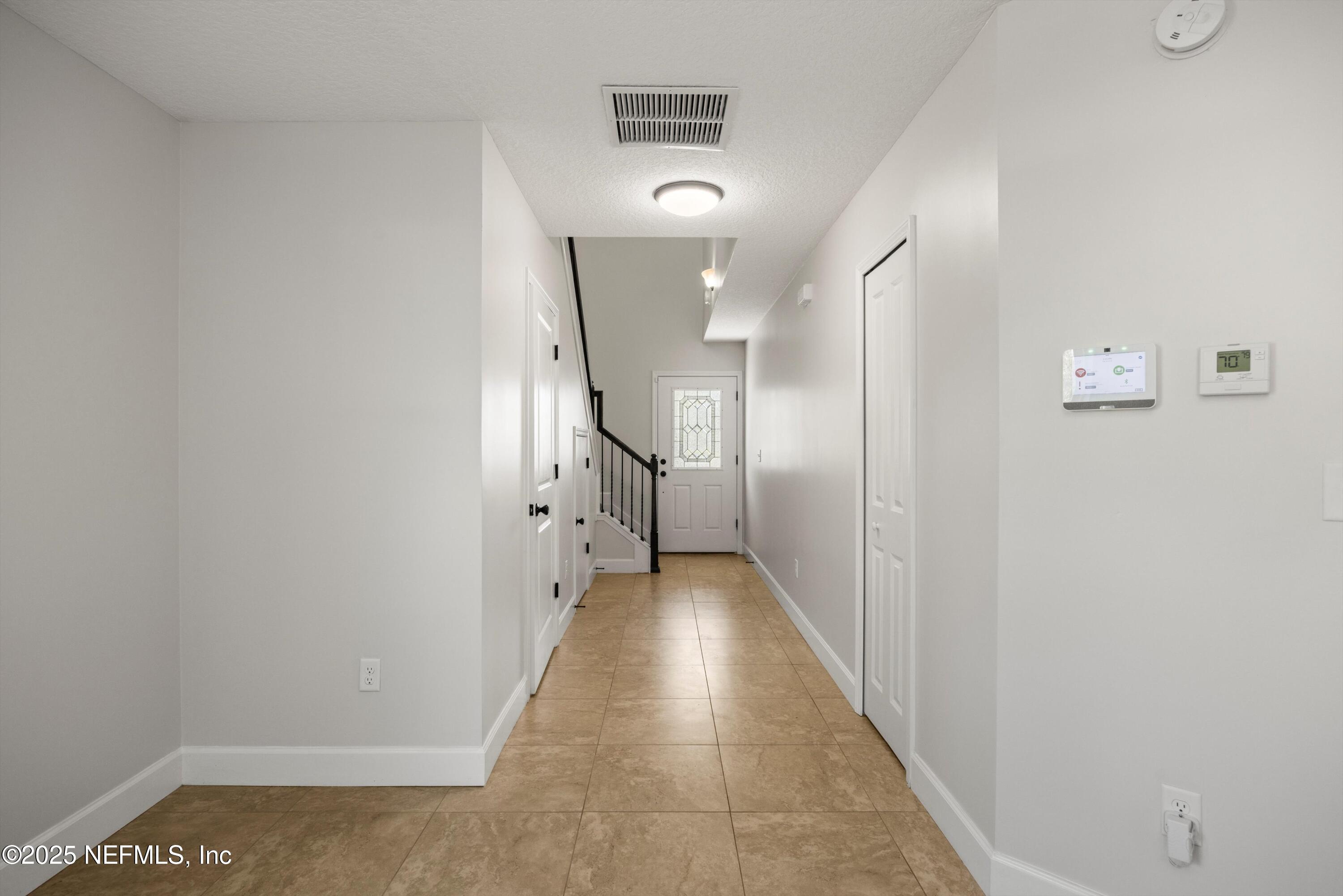 366 Old Jennings Road Orange Park, FL 32065 - Photo 5 of 40 a view of a hallway with wooden floor