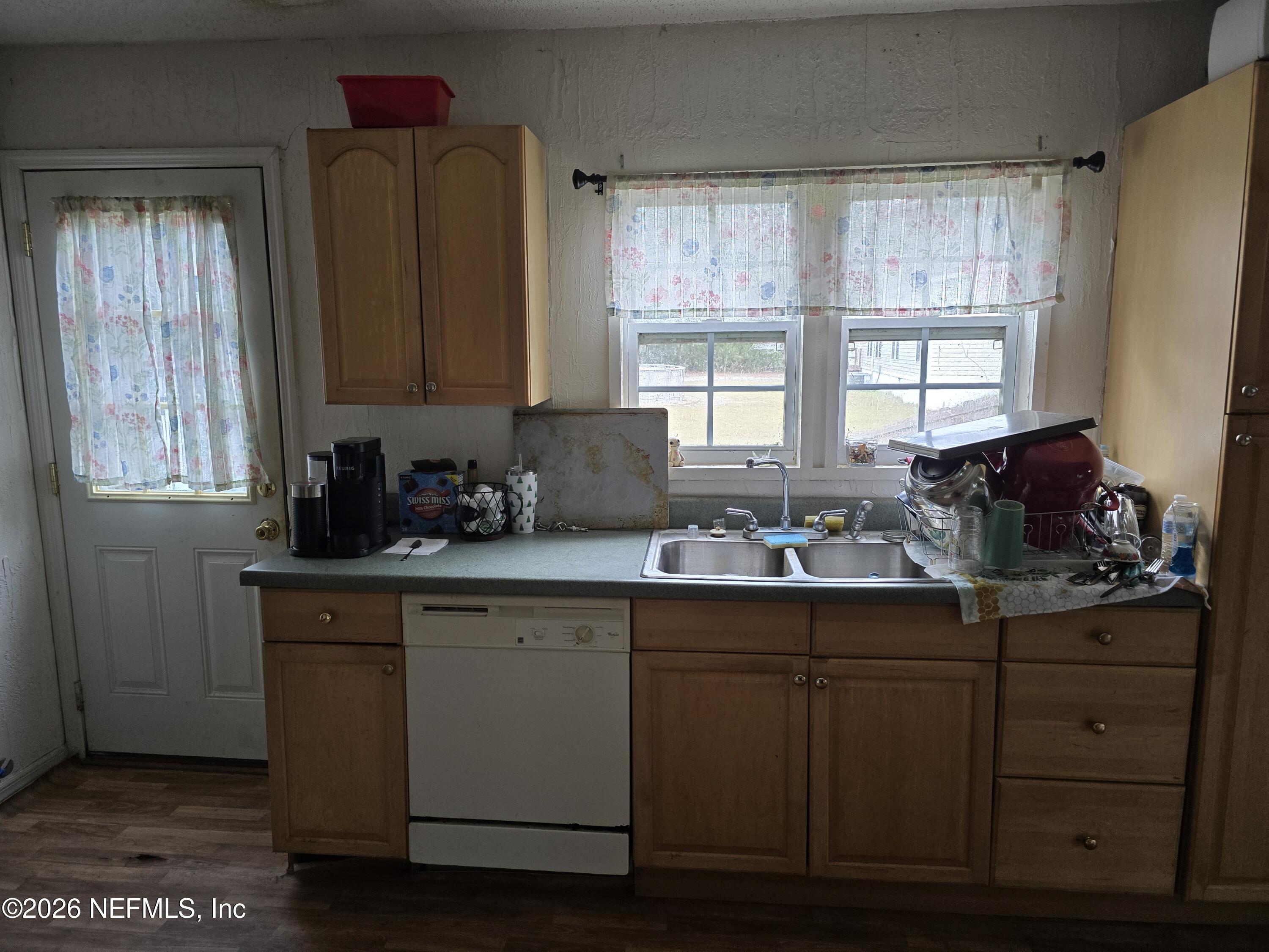 113 Tyre Road Interlachen, FL 32148 - Photo 15 of 15 a kitchen with sink cabinets and window