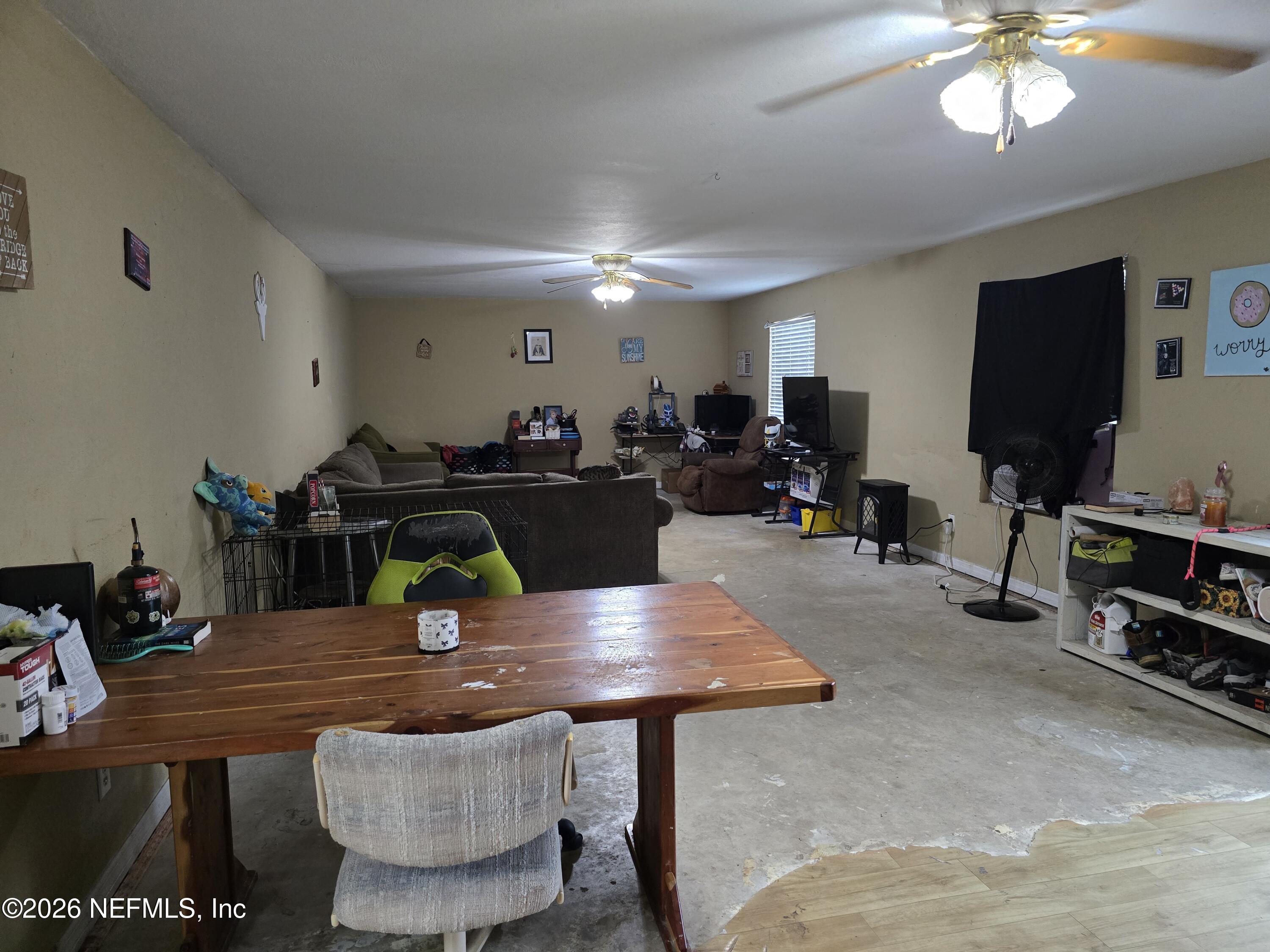 113 Tyre Road Interlachen, FL 32148 - Photo 5 of 15 a view of a dining room with furniture