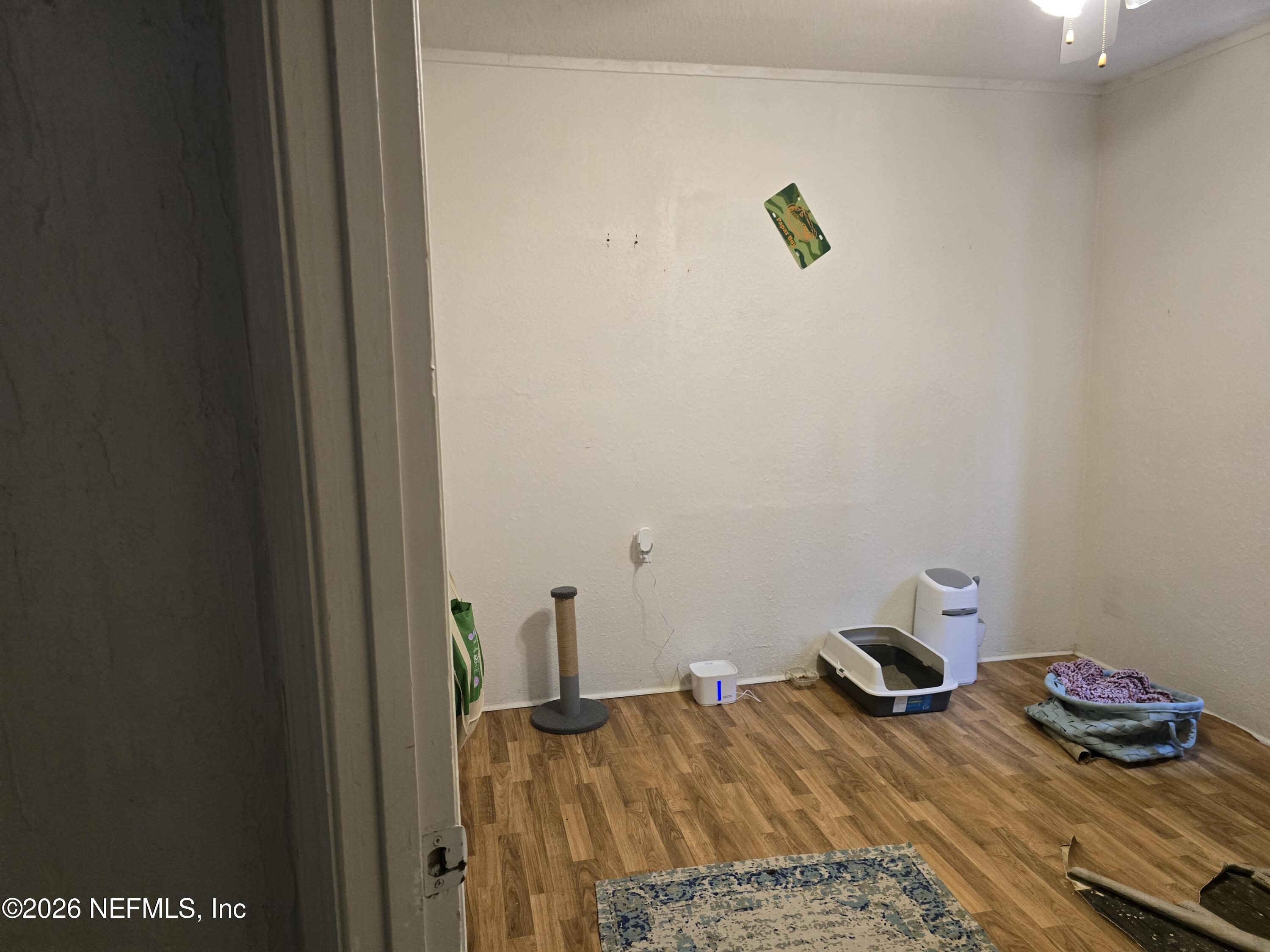 113 Tyre Road Interlachen, FL 32148 - Photo 8 of 15 a bedroom with a bed and a window