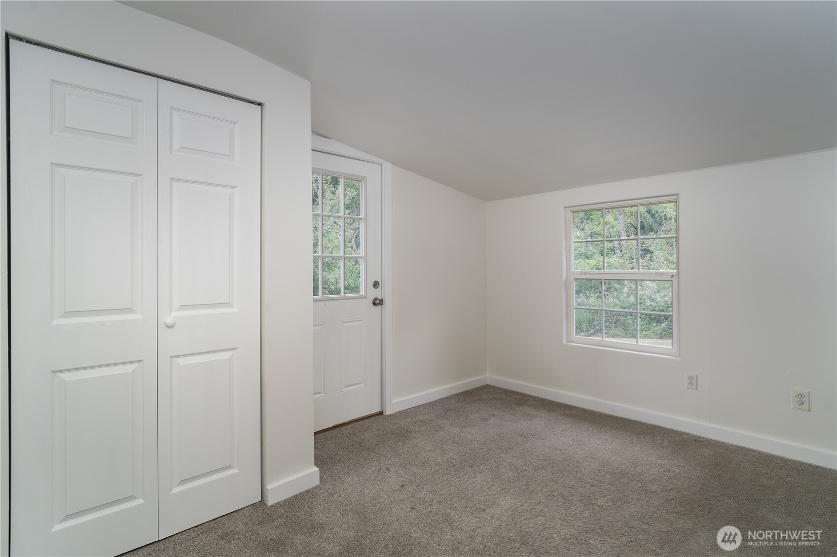 21405 Thompson Creek Road Southeast Tenino, WA 98589 - Photo 13 of 26 a view of an empty room with a window