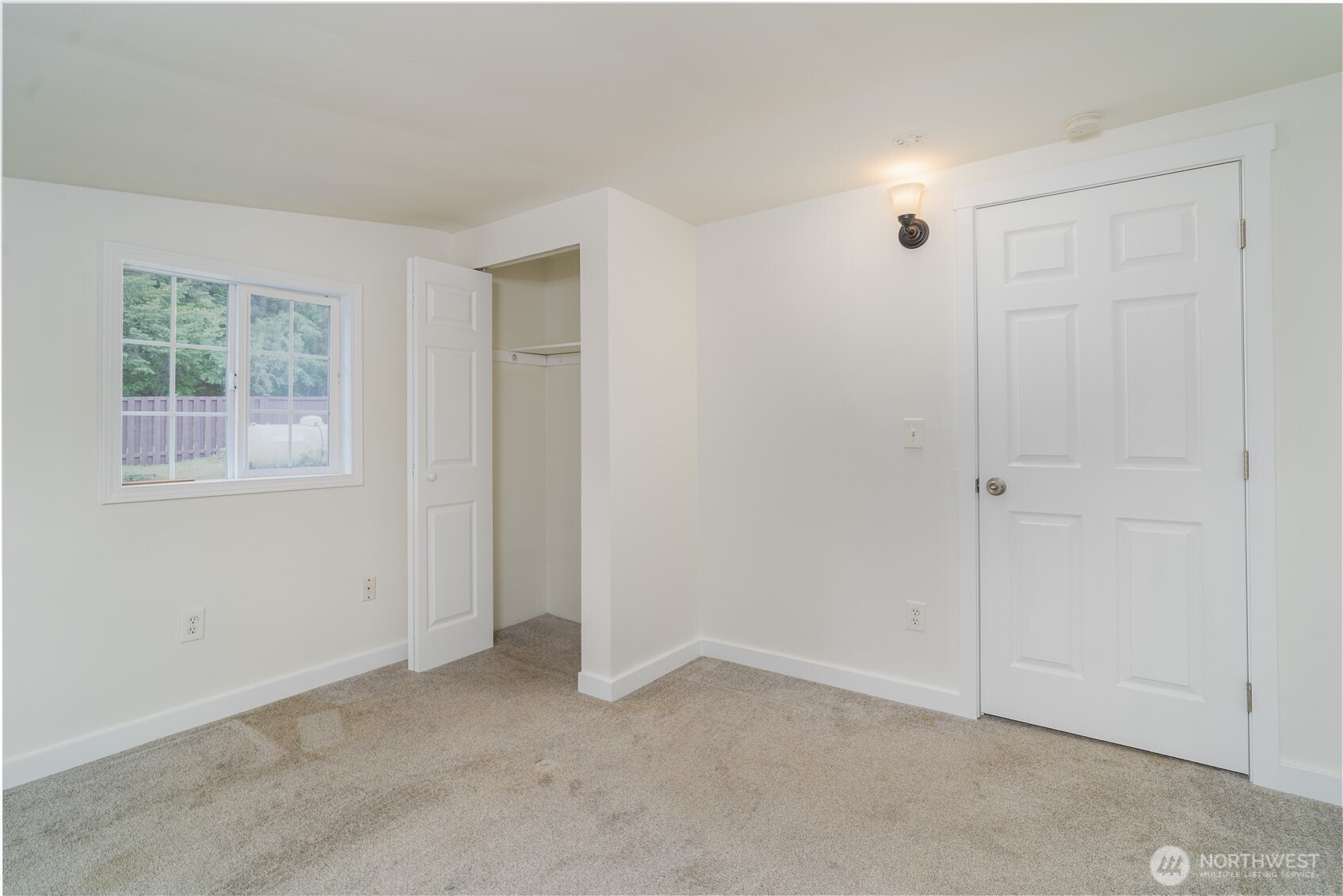 21405 Thompson Creek Road Southeast Tenino, WA 98589 - Photo 18 of 26 an empty room with windows