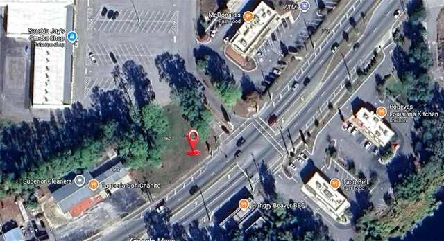 a view of a playground with basketball court