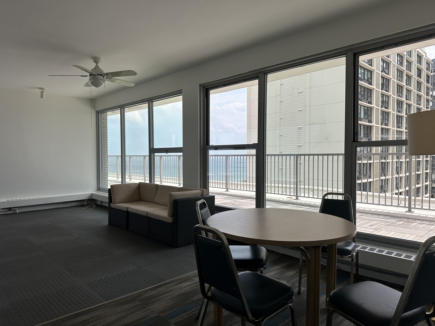 5757 North Sheridan Road, Unit 17H Chicago, IL 60660 - Photo 24 of 25 a living room with furniture and a window