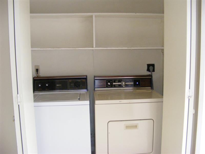 703 Yegua Street, Unit 4 Bryan, TX 77801 - Photo 8 of 10 a utility room with dryer and washer