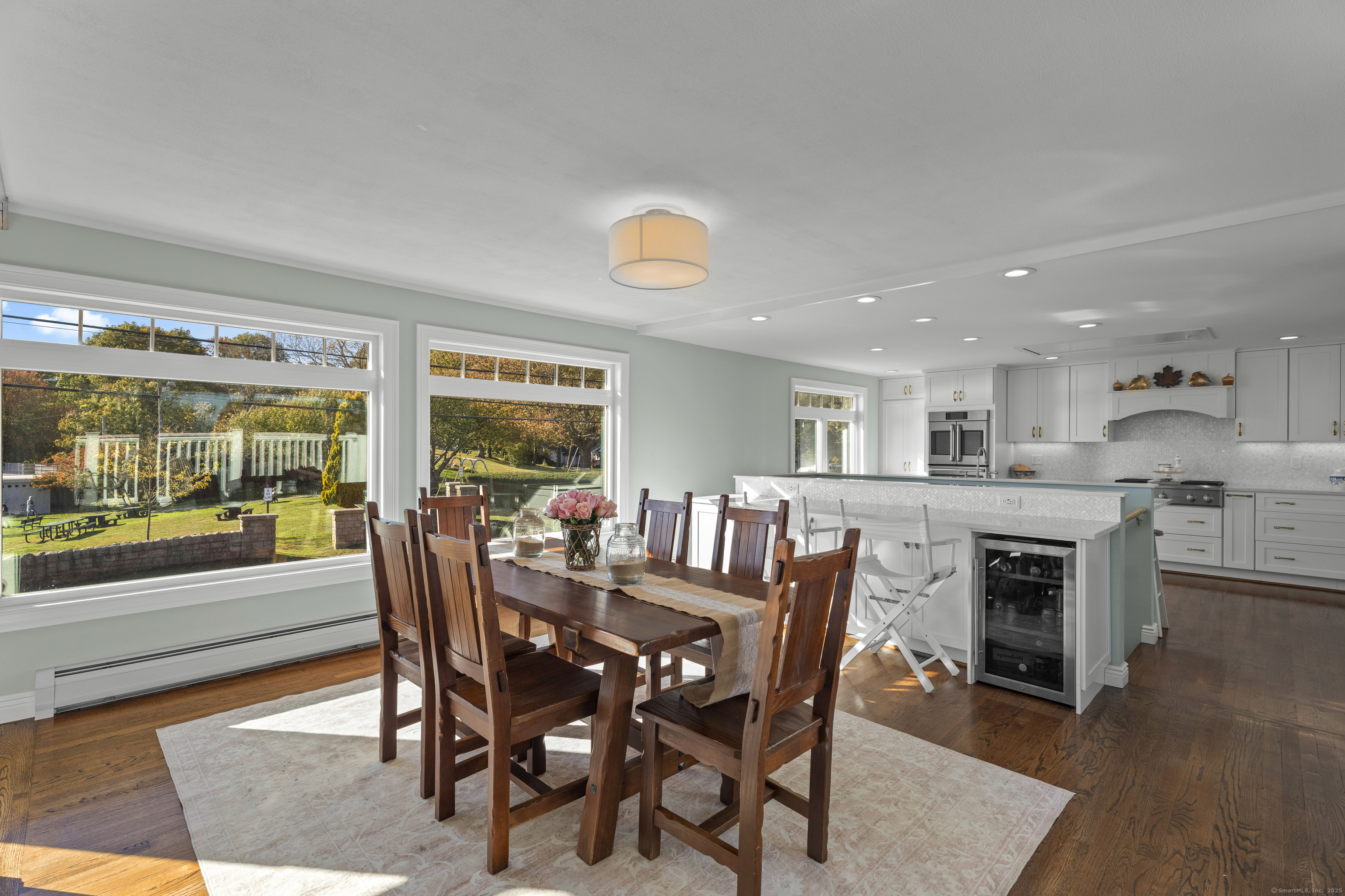 21 Harbor Street Branford, CT 06405 - Photo 12 of 40 a view of a dining room with furniture window and wooden floor