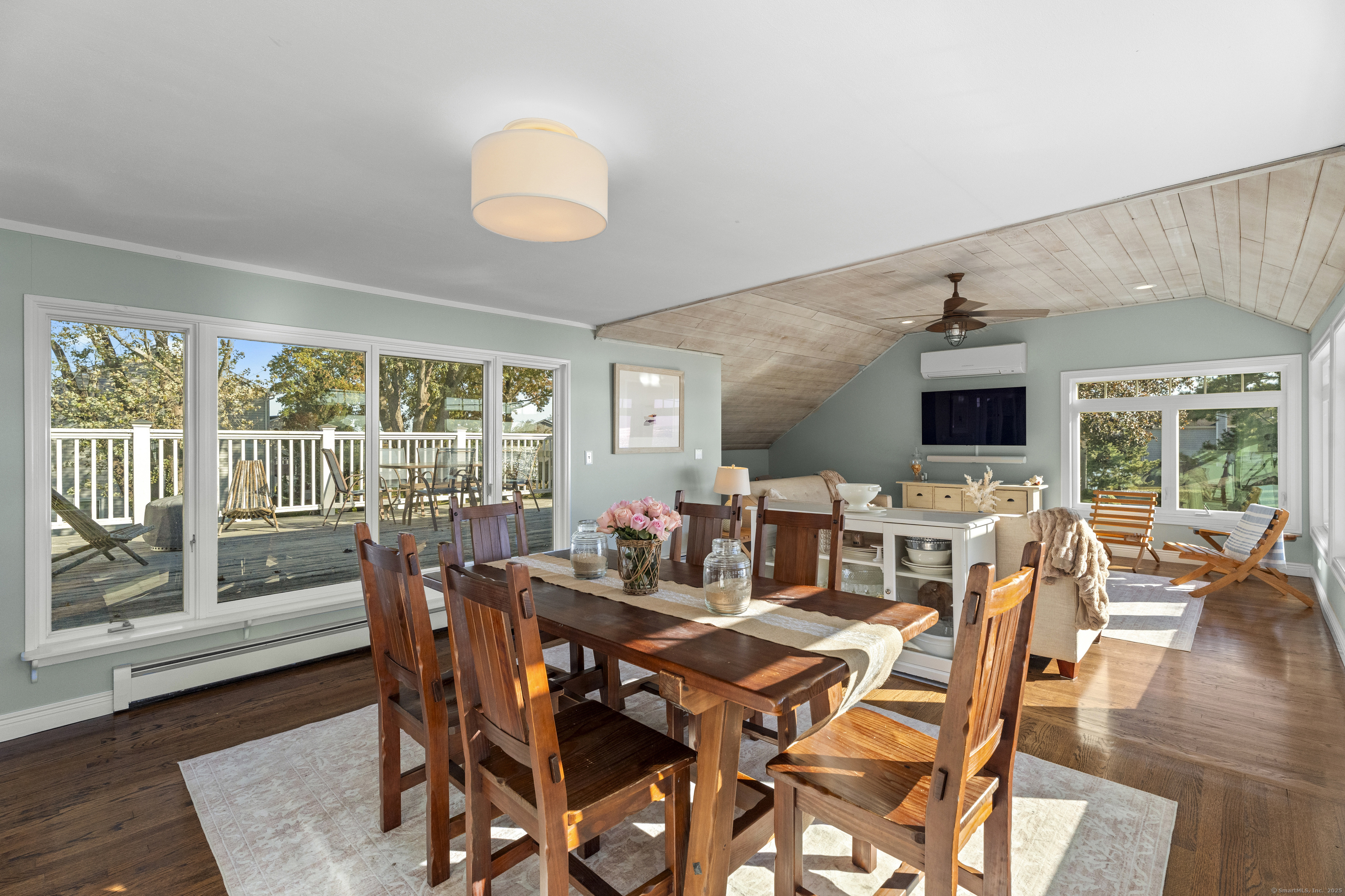 21 Harbor Street Branford, CT 06405 - Photo 13 of 40 a view of a dining room with furniture window and wooden floor