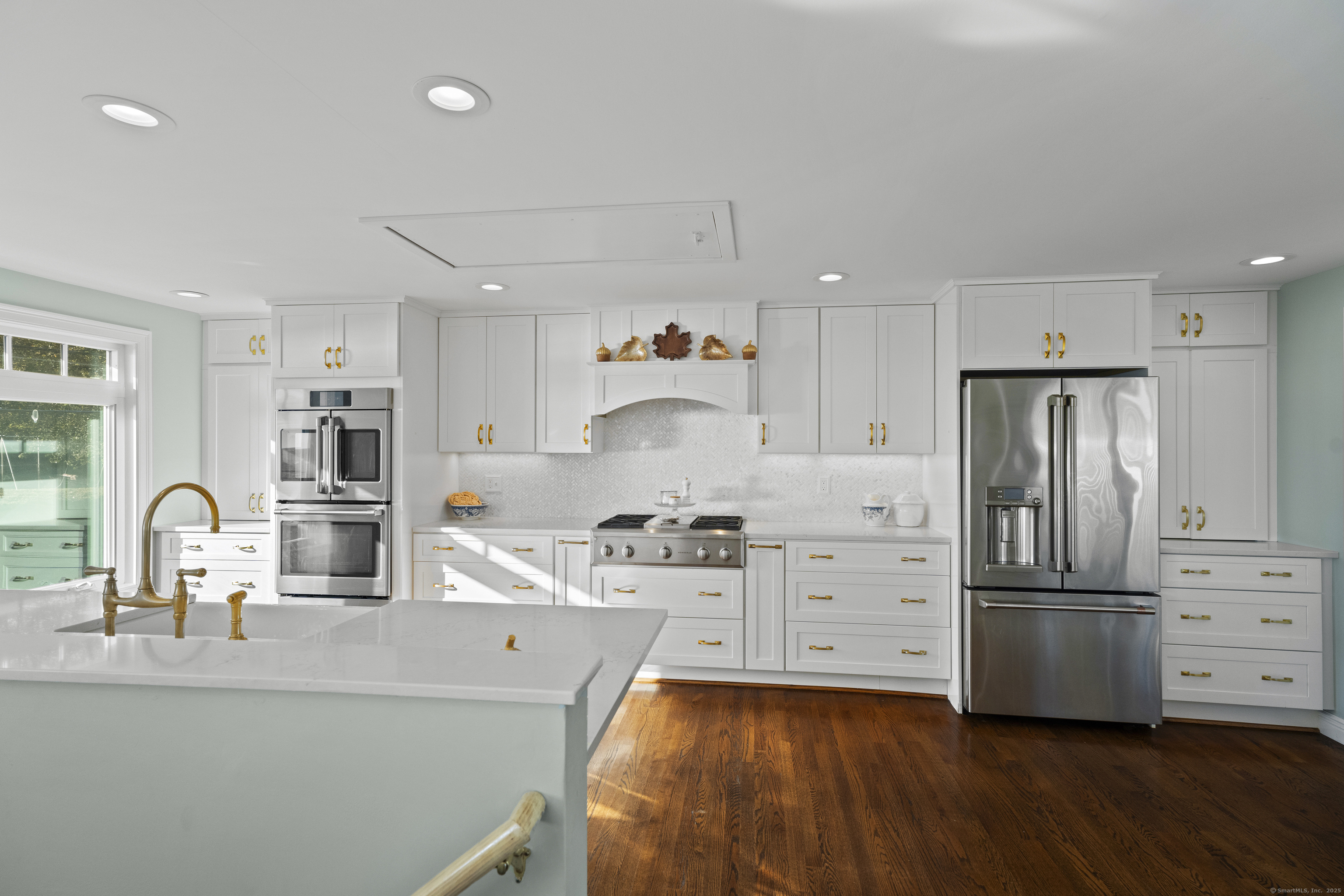 21 Harbor Street Branford, CT 06405 - Photo 15 of 40 a kitchen with refrigerator a stove and a sink