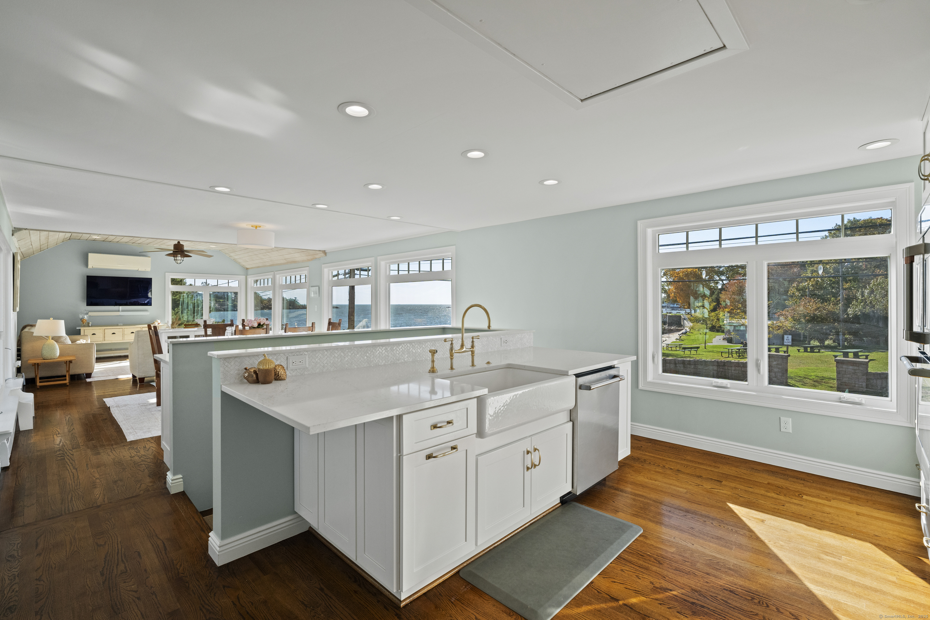 21 Harbor Street Branford, CT 06405 - Photo 16 of 40 a kitchen with sink attached with living room