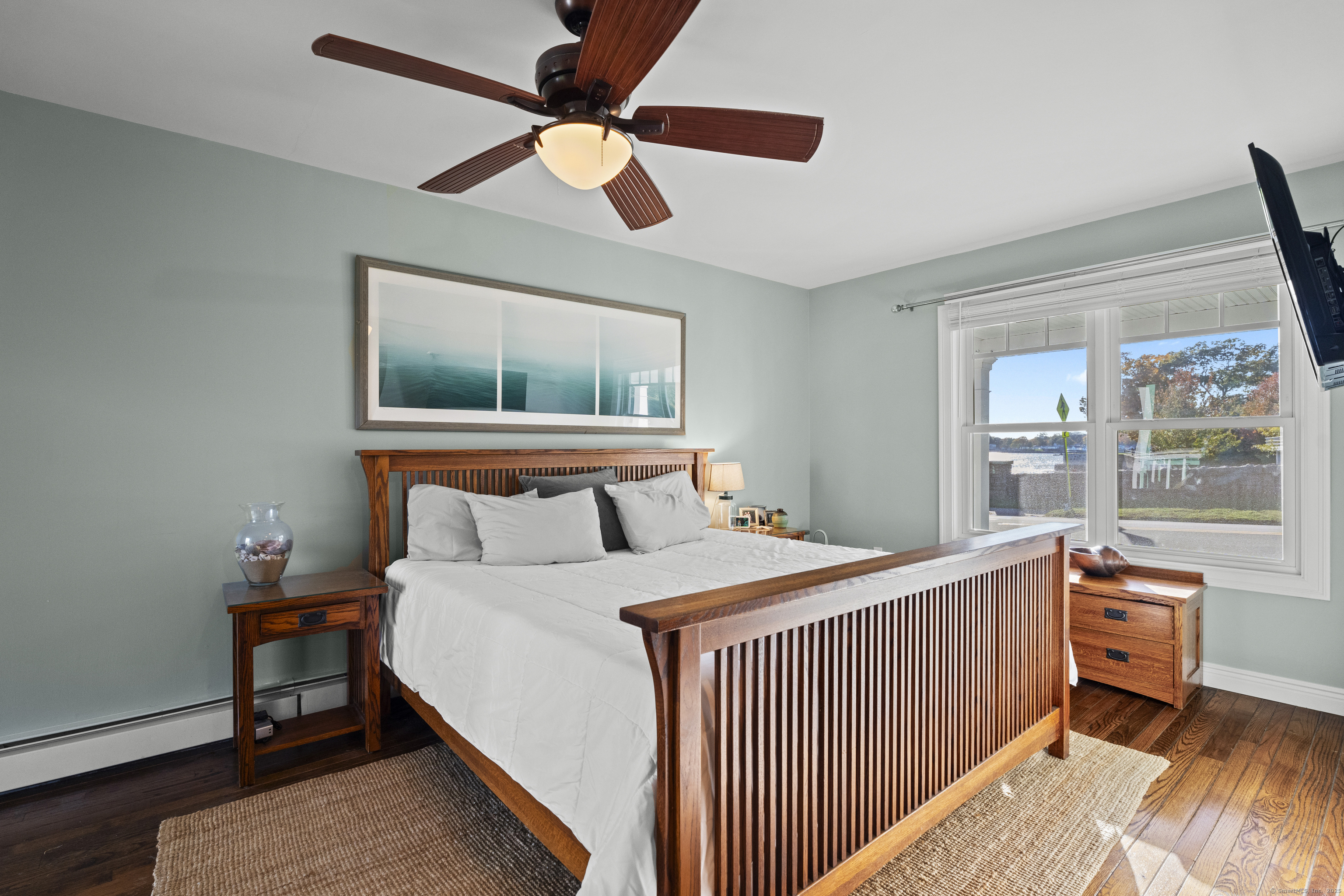 21 Harbor Street Branford, CT 06405 - Photo 20 of 40 a bedroom with a bed and a window