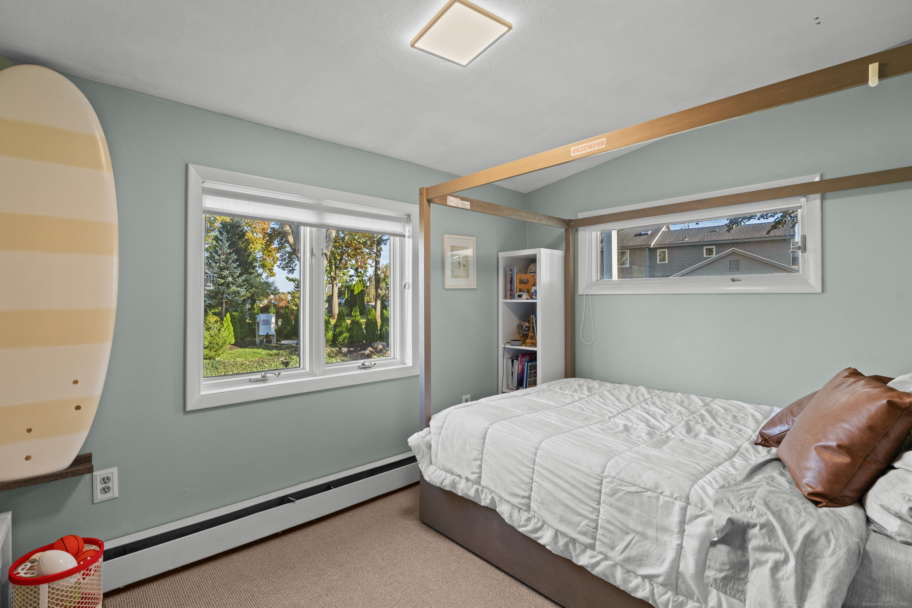 21 Harbor Street Branford, CT 06405 - Photo 27 of 40 a bedroom with a bed and a window