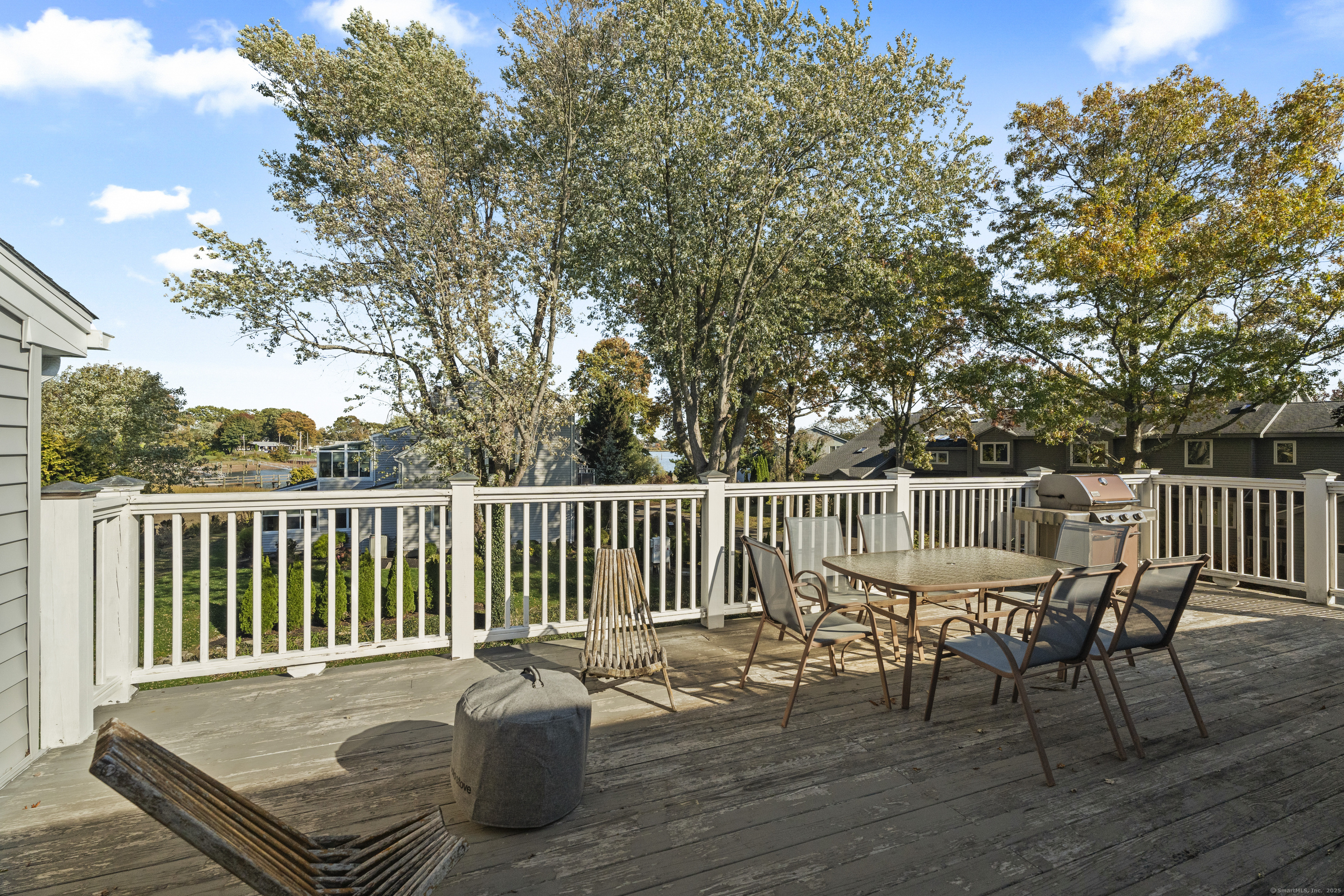 21 Harbor Street Branford, CT 06405 - Photo 32 of 40 a view of a chair and table on the wooden floor
