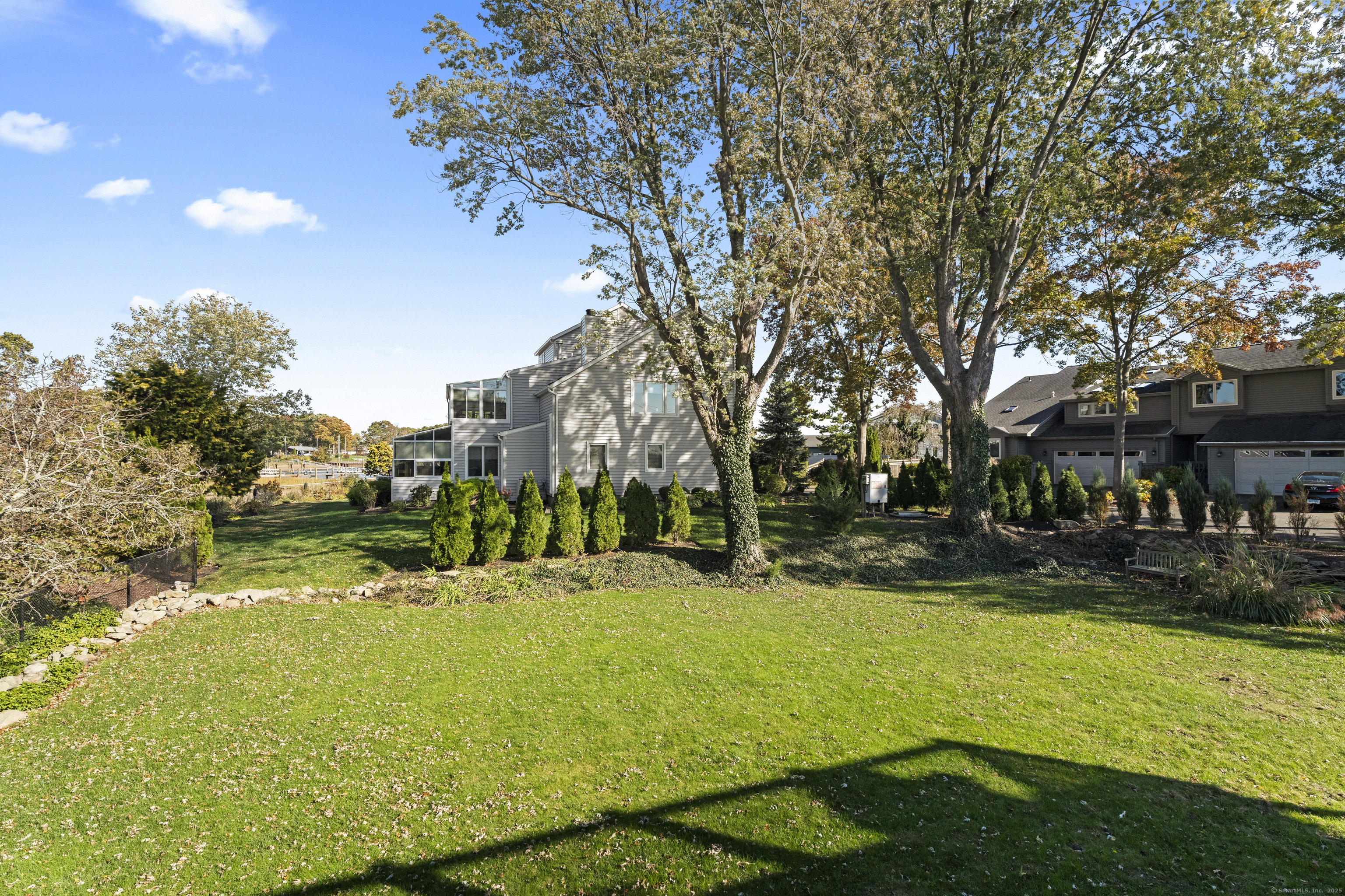 21 Harbor Street Branford, CT 06405 - Photo 35 of 40 a view of yard with swimming pool and green space