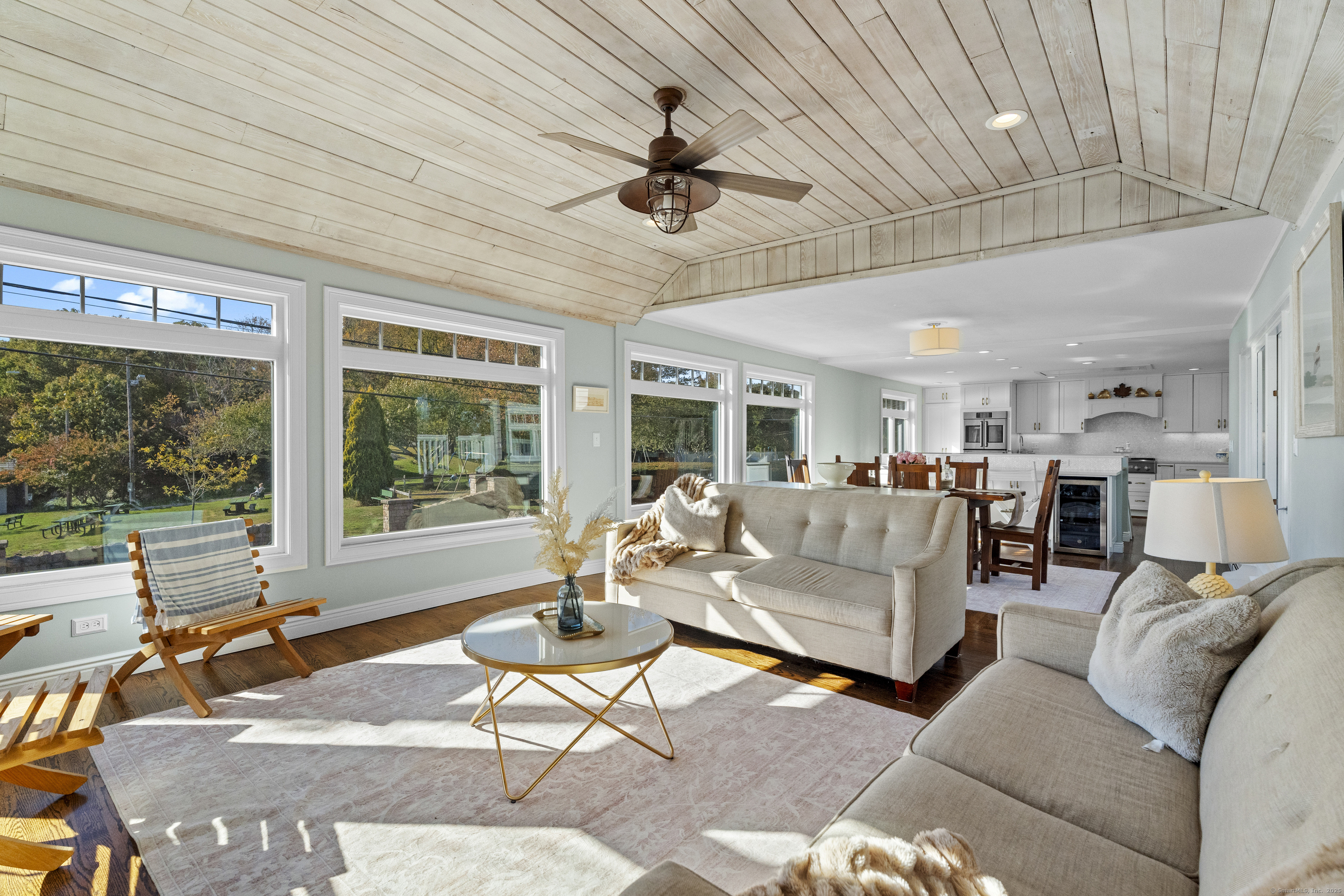 21 Harbor Street Branford, CT 06405 - Photo 9 of 40 a living room with furniture and a large window
