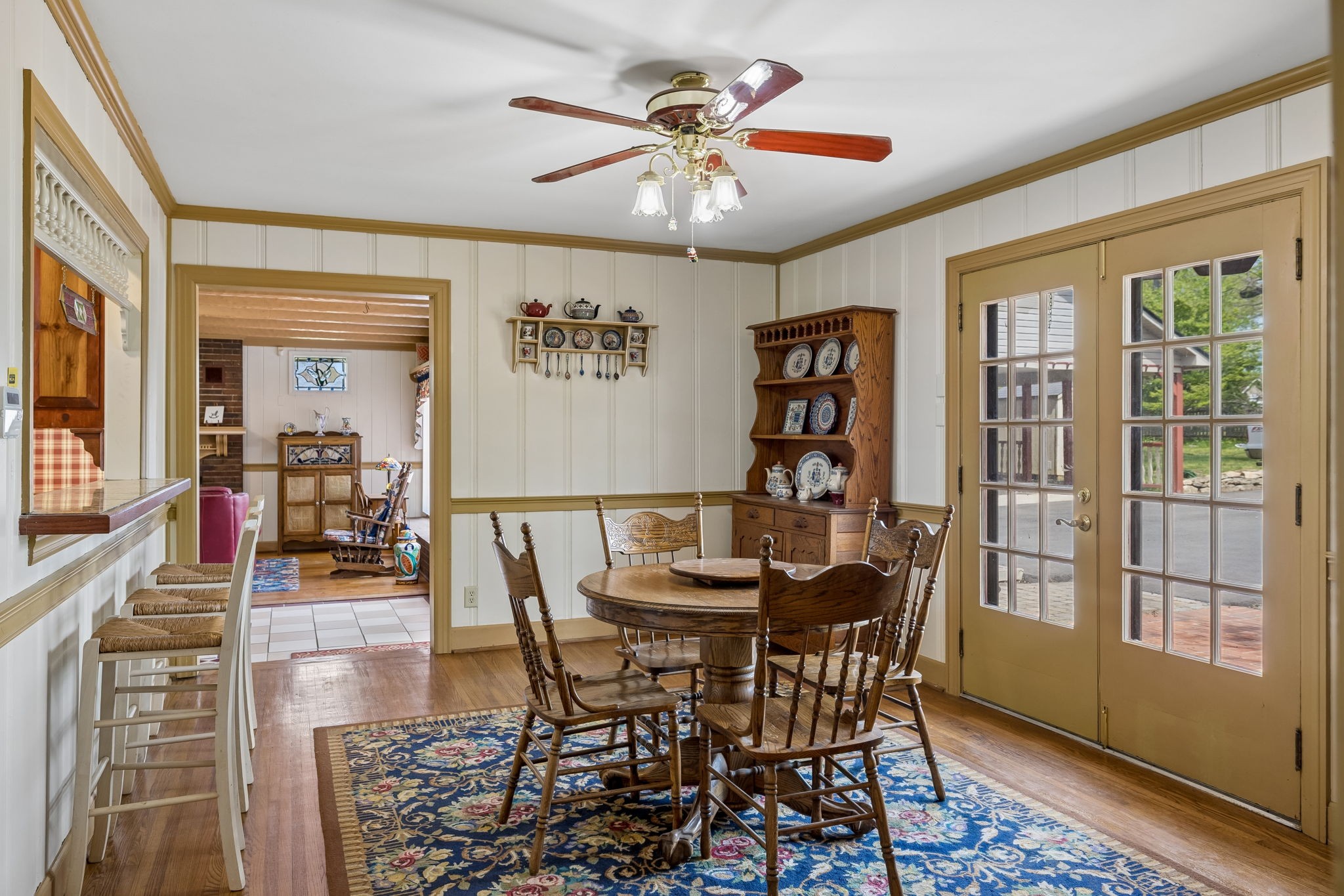 3120 Knobdale Road Nashville, TN 37214 - Photo 16 of 65 a view of a dining room with furniture wooden floor and chandelier