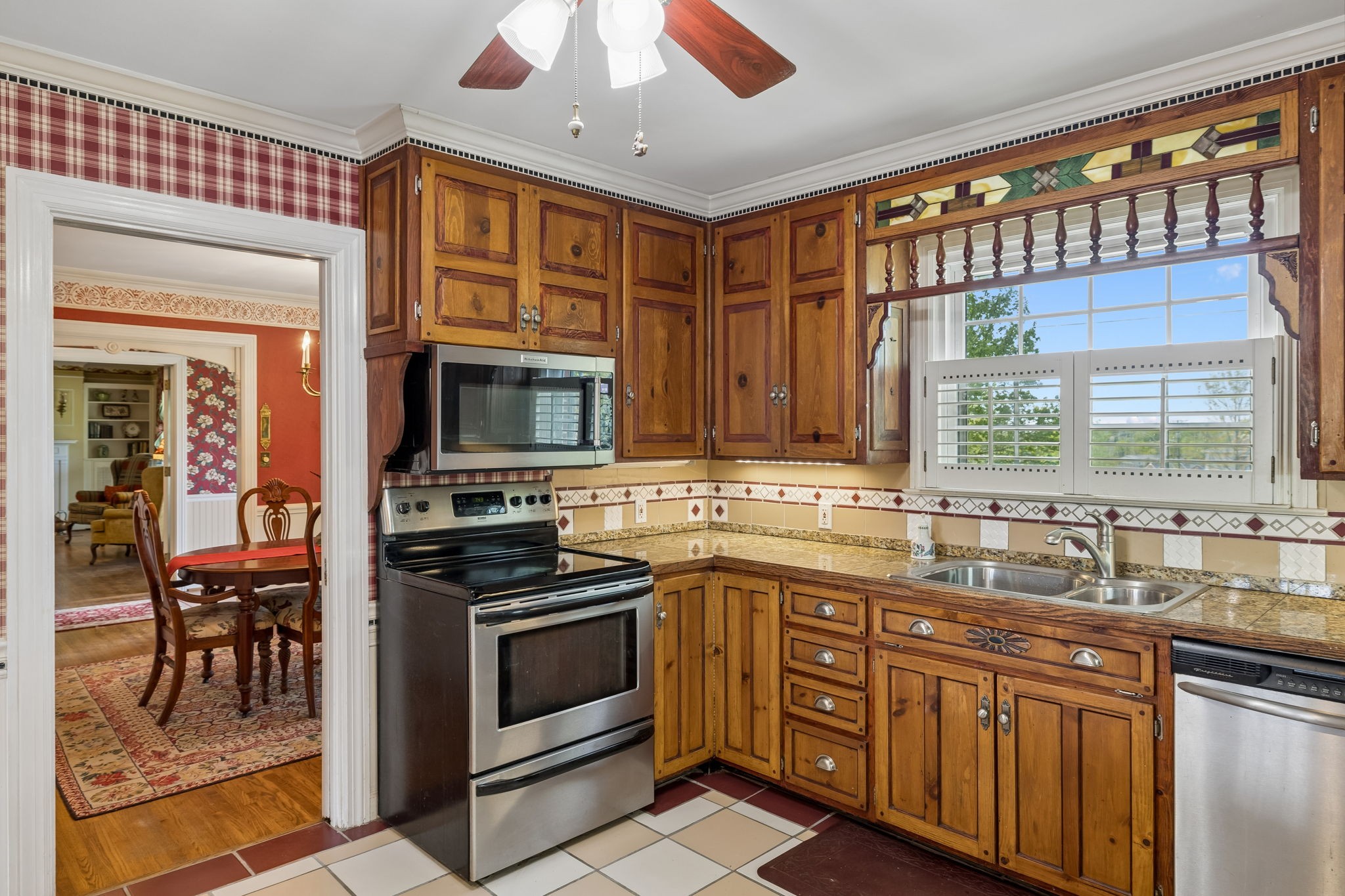 3120 Knobdale Road Nashville, TN 37214 - Photo 21 of 65 a kitchen with stainless steel appliances granite countertop a stove and a sink