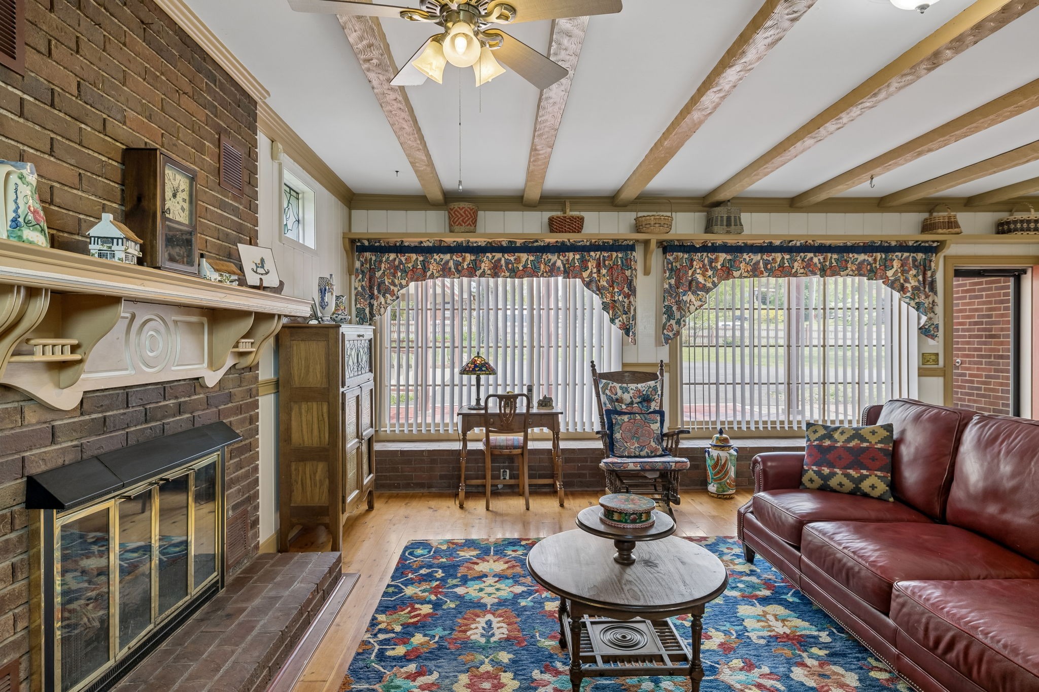 3120 Knobdale Road Nashville, TN 37214 - Photo 28 of 65 a living room with furniture a fireplace and a table