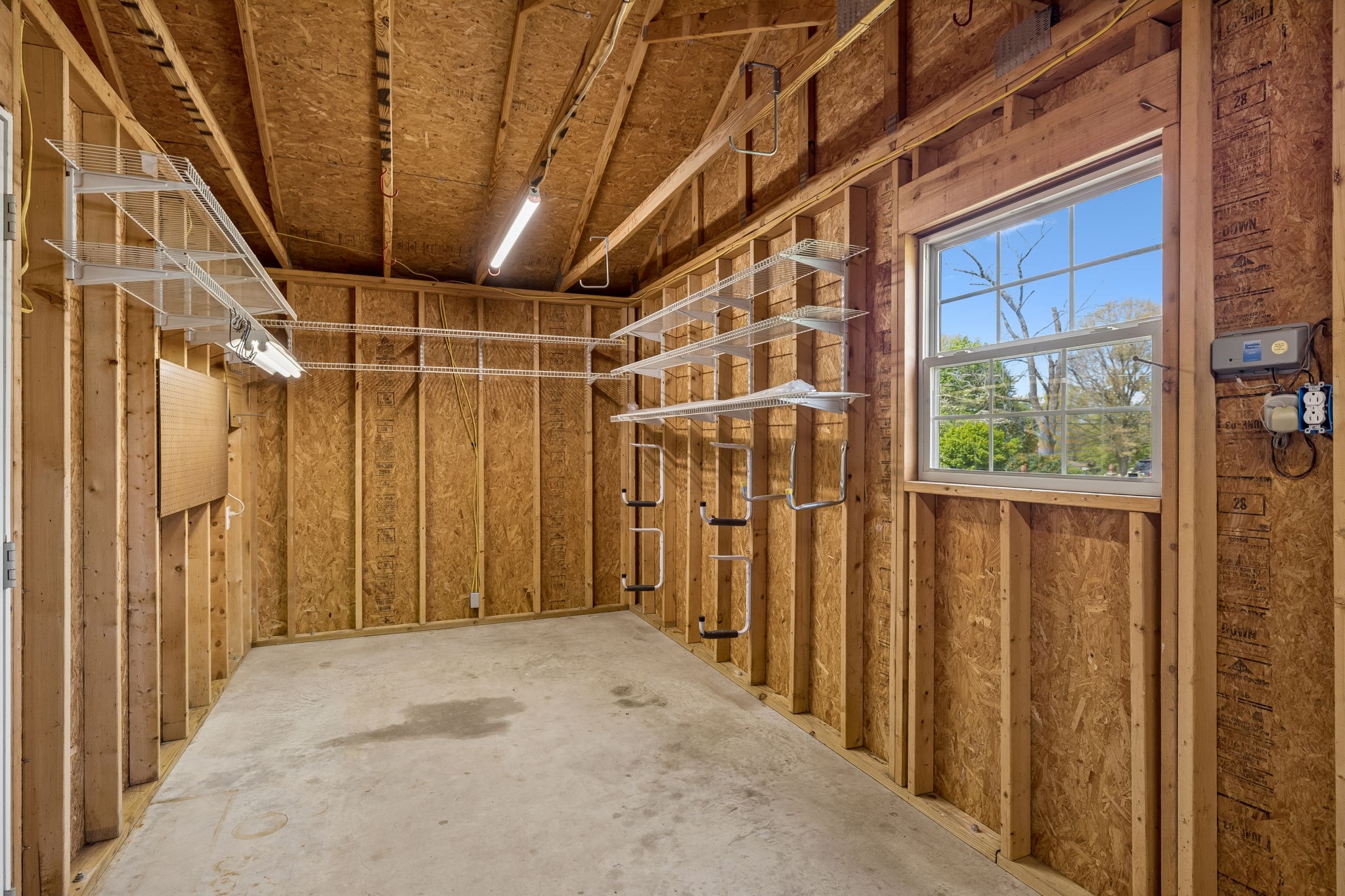3120 Knobdale Road Nashville, TN 37214 - Photo 53 of 65 a view of a hallway with wooden walls