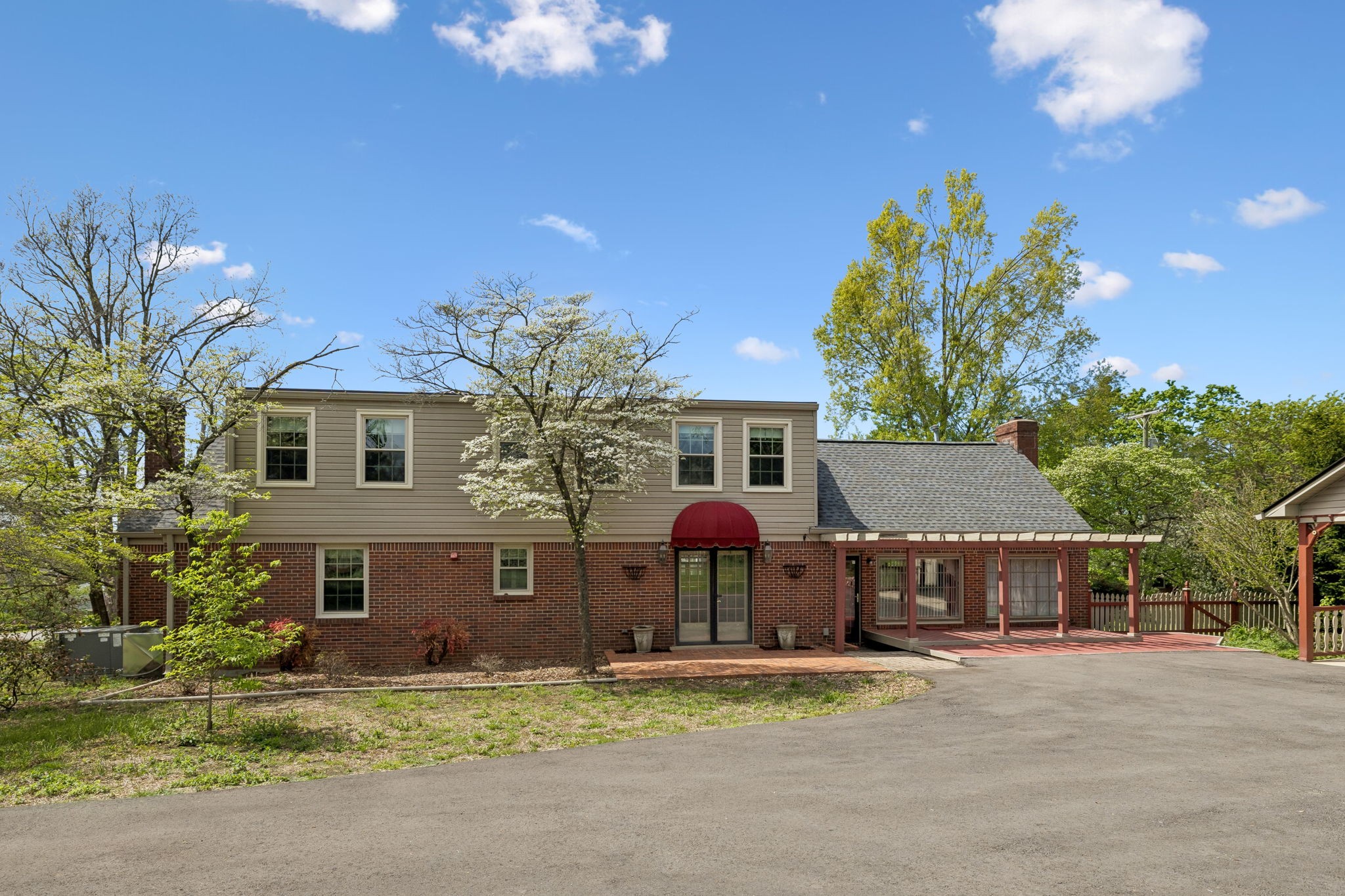 3120 Knobdale Road Nashville, TN 37214 - Photo 55 of 65 a front view of a house with a yard and garage