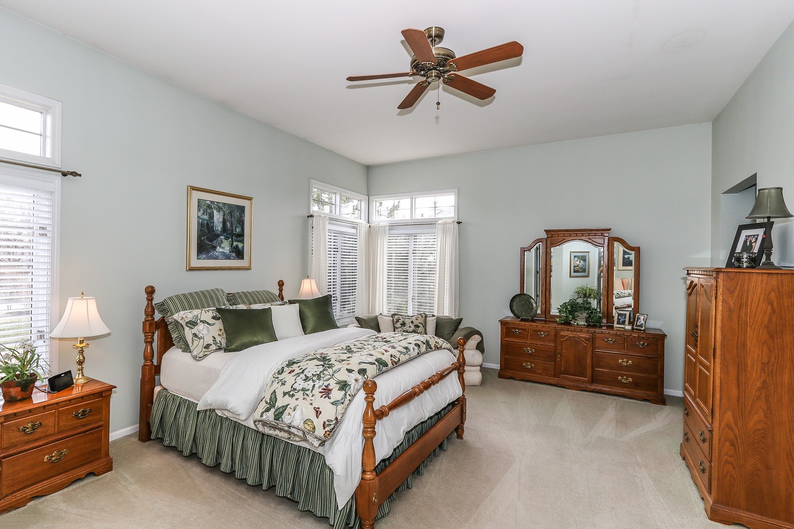 4929 Commonwealth Avenue Western Springs, IL 60558 - Photo 14 of 32 a bedroom with a bed dresser and window