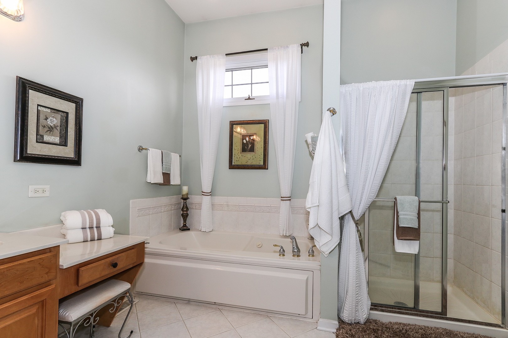 4929 Commonwealth Avenue Western Springs, IL 60558 - Photo 17 of 32 a bathroom with a bathtub and a shower