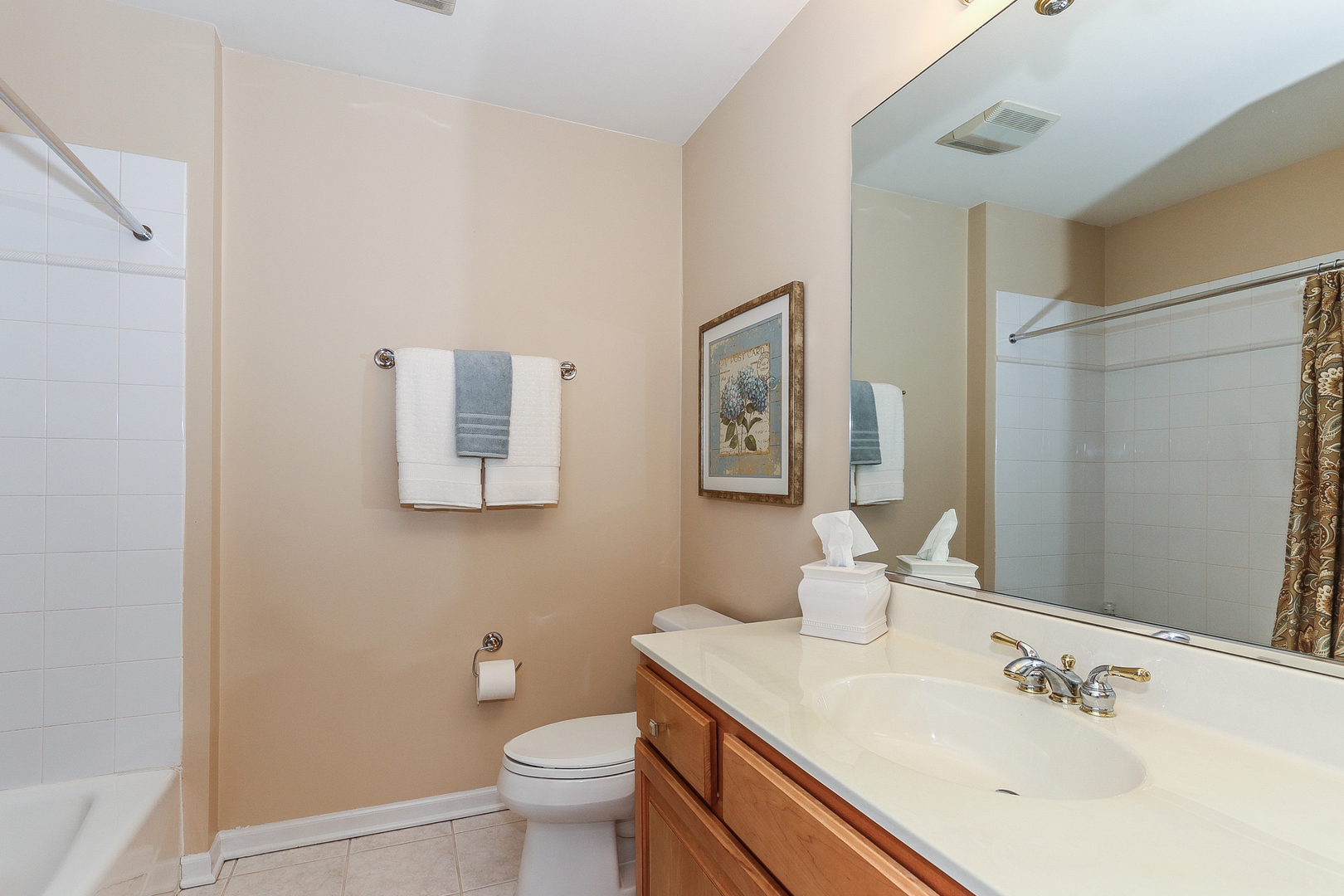 4929 Commonwealth Avenue Western Springs, IL 60558 - Photo 19 of 32 a bathroom with a sink toilet and vanity