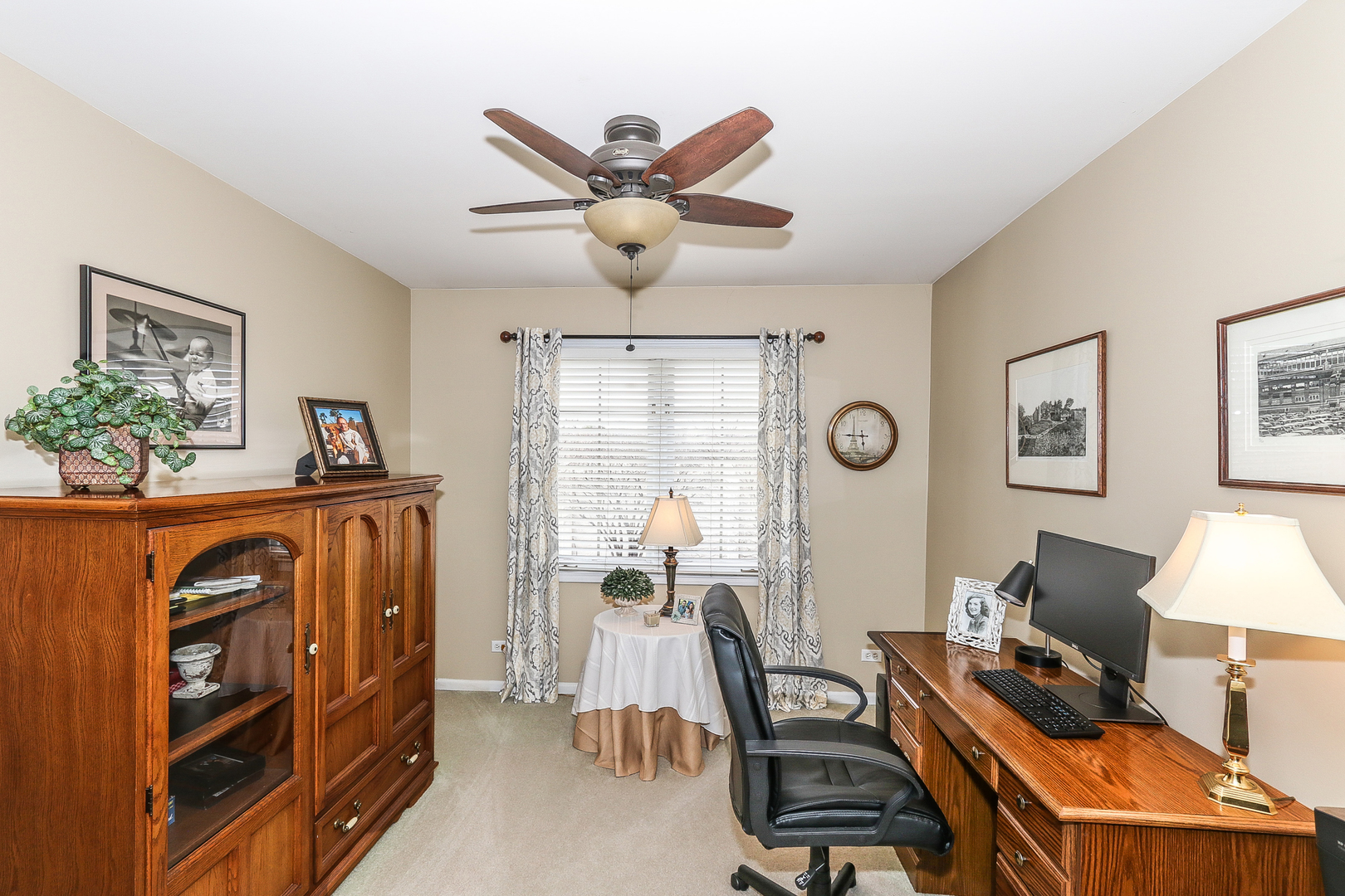 4929 Commonwealth Avenue Western Springs, IL 60558 - Photo 20 of 32 a view of a workspace with furniture and a window