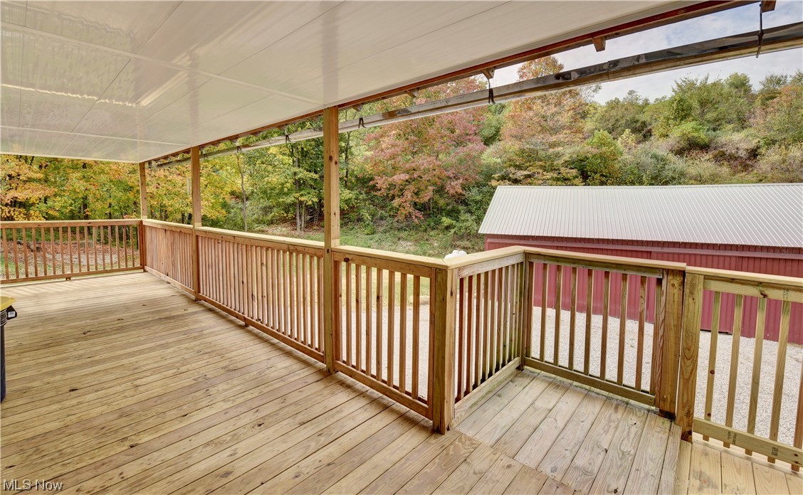 9734 Edwards Ridge Road Southeast Uhrichsville, OH 44683 - Photo 12 of 35 View of wooden terrace