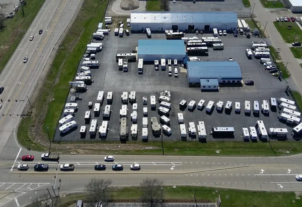 an aerial view of a building with outdoor space