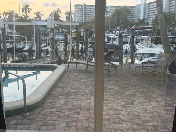 a view of a terrace with sitting area