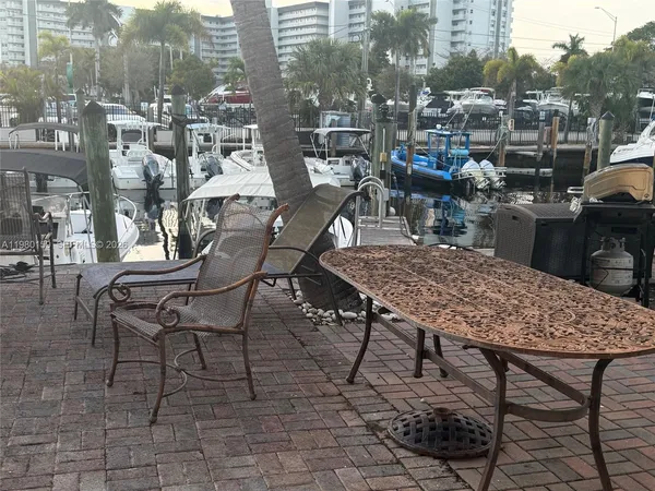 a view of a terrace with furniture