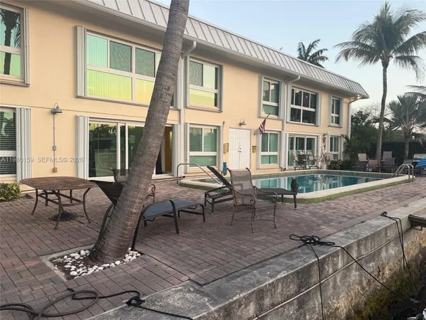 a view of balcony with furniture