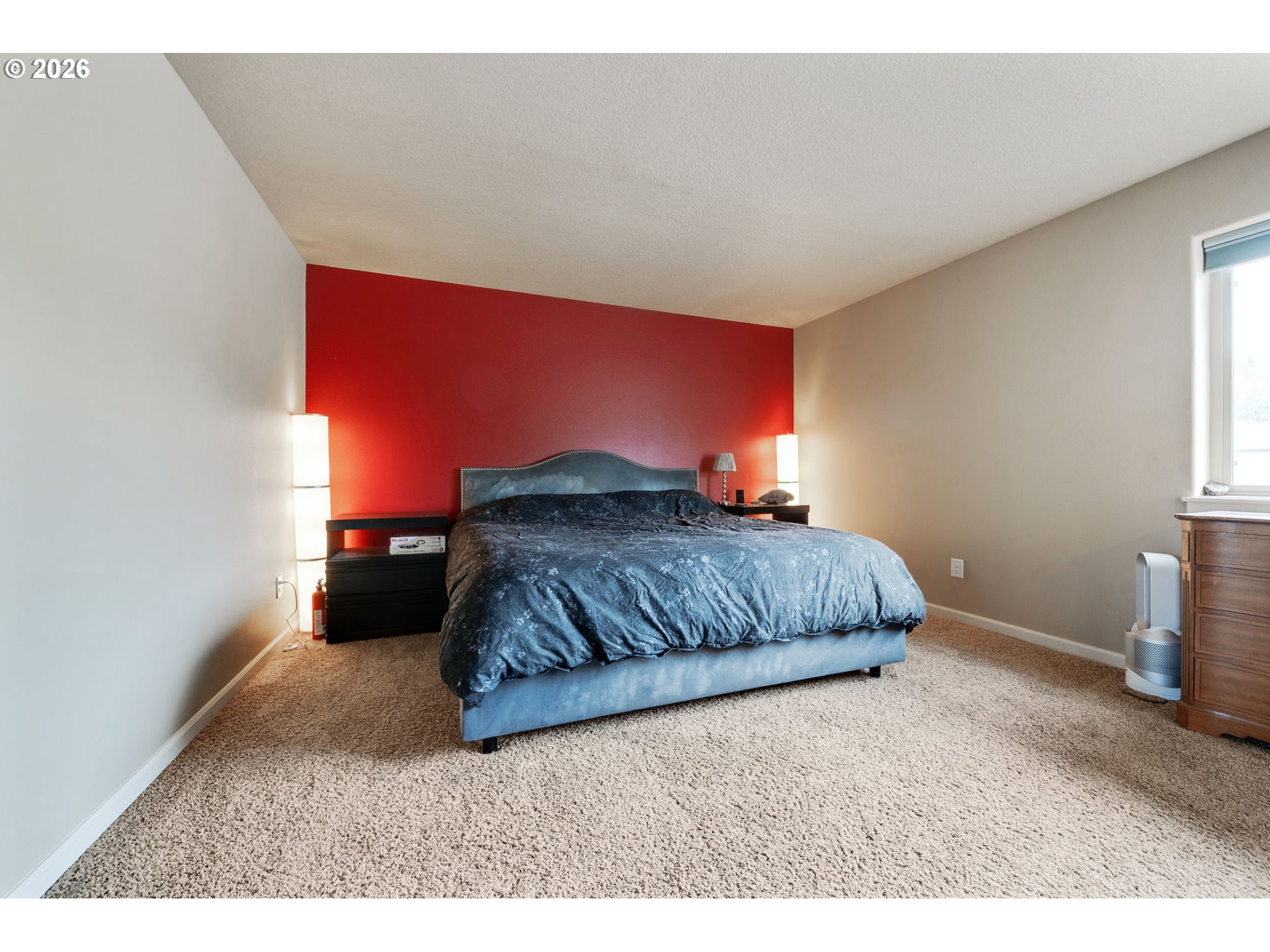 110 Northwest 24th Street Battle Ground, WA 98604 - Photo 13 of 20 a bedroom with a bed and a window