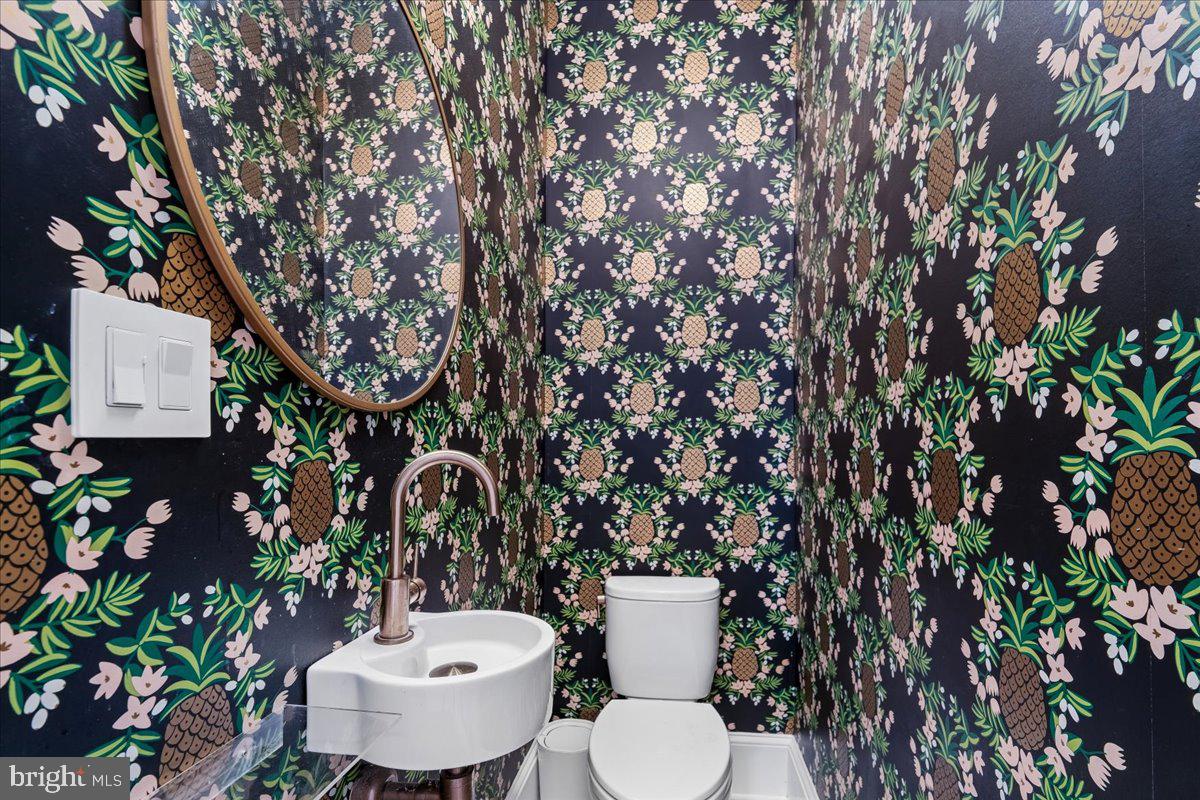 1105 G Street Southeast Washington, DC 20003 - Photo 19 of 51 Main level half-bath, a little jewel box!