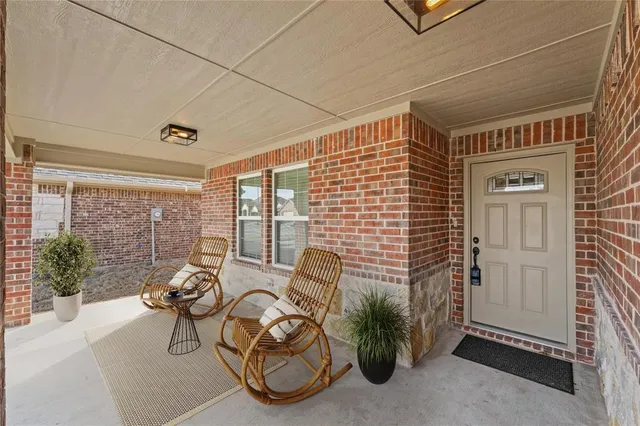 a balcony with furniture and water view