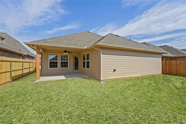 a view of a backyard of house