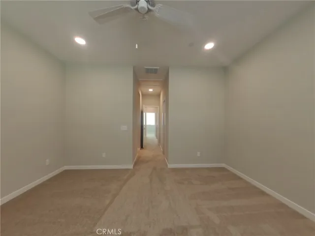 an empty room with a empty space and a window