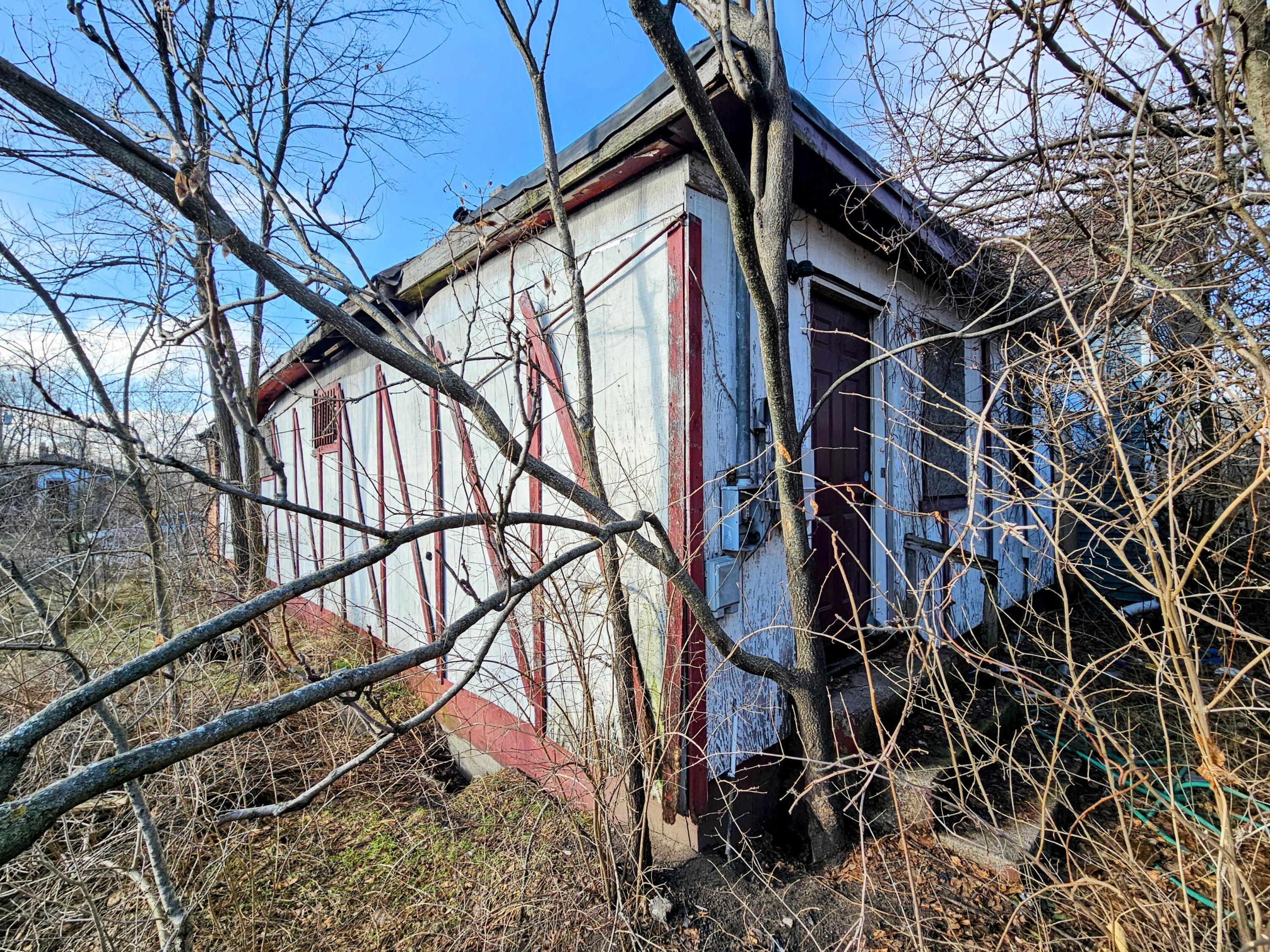 2443 Delaware Street Gary, IN 46407 - Photo 3 of 7 a backyard of a house with lots of green space