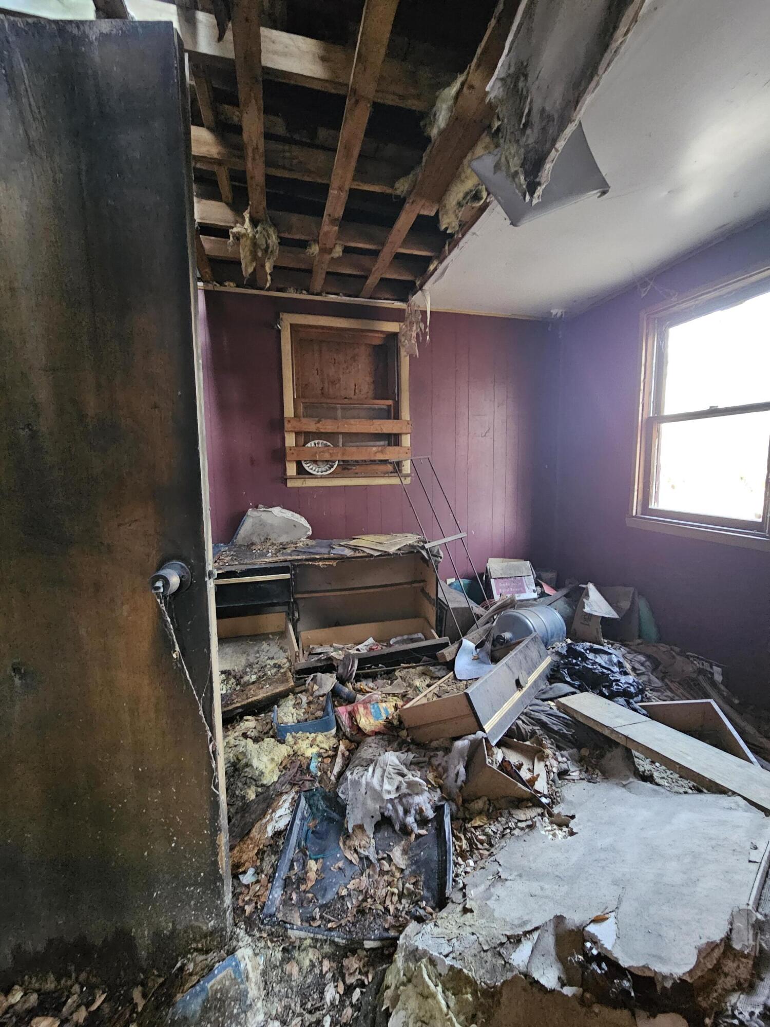 2443 Delaware Street Gary, IN 46407 - Photo 5 of 7 a view of a room with chairs