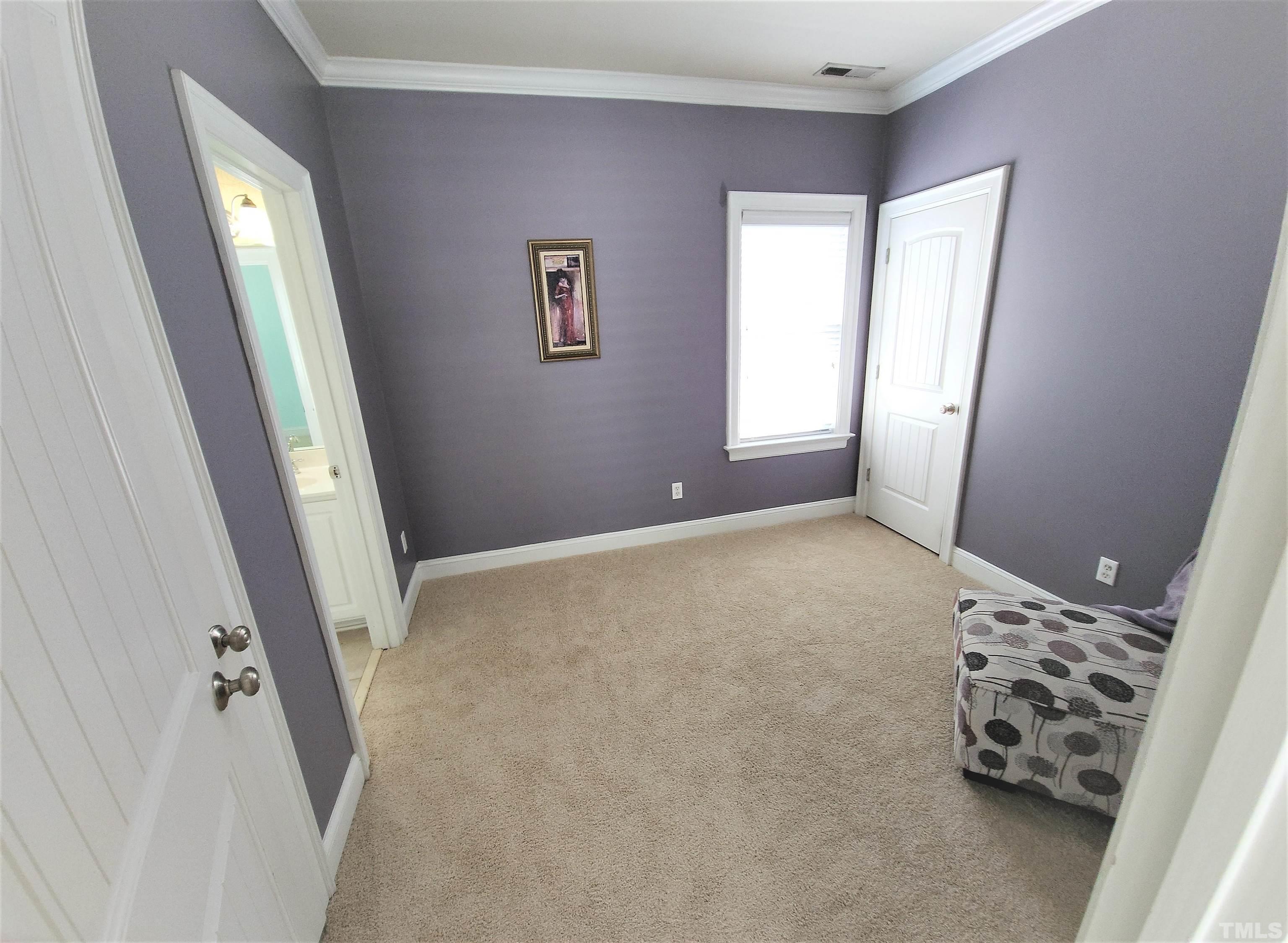 7738 ACC Boulevard Raleigh, NC 27617 - Photo 13 of 17 a view of livingroom with hardwood