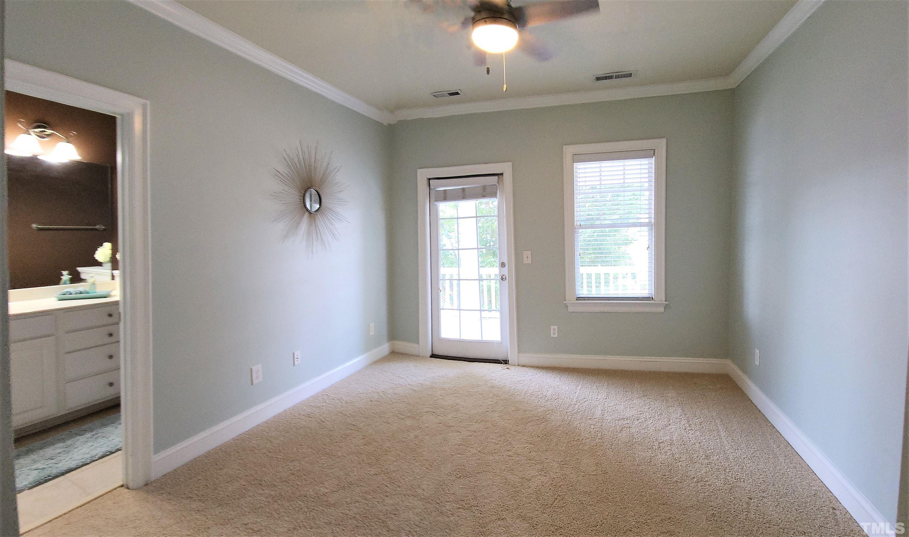 7738 ACC Boulevard Raleigh, NC 27617 - Photo 14 of 17 a view of livingroom with window