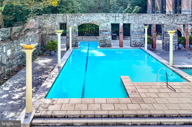 a view of a backyard with sitting area