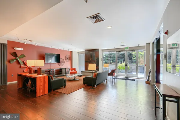 a view of a backyard with sitting area