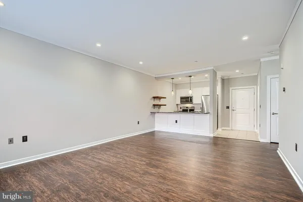 a view of kitchen with wooden floor