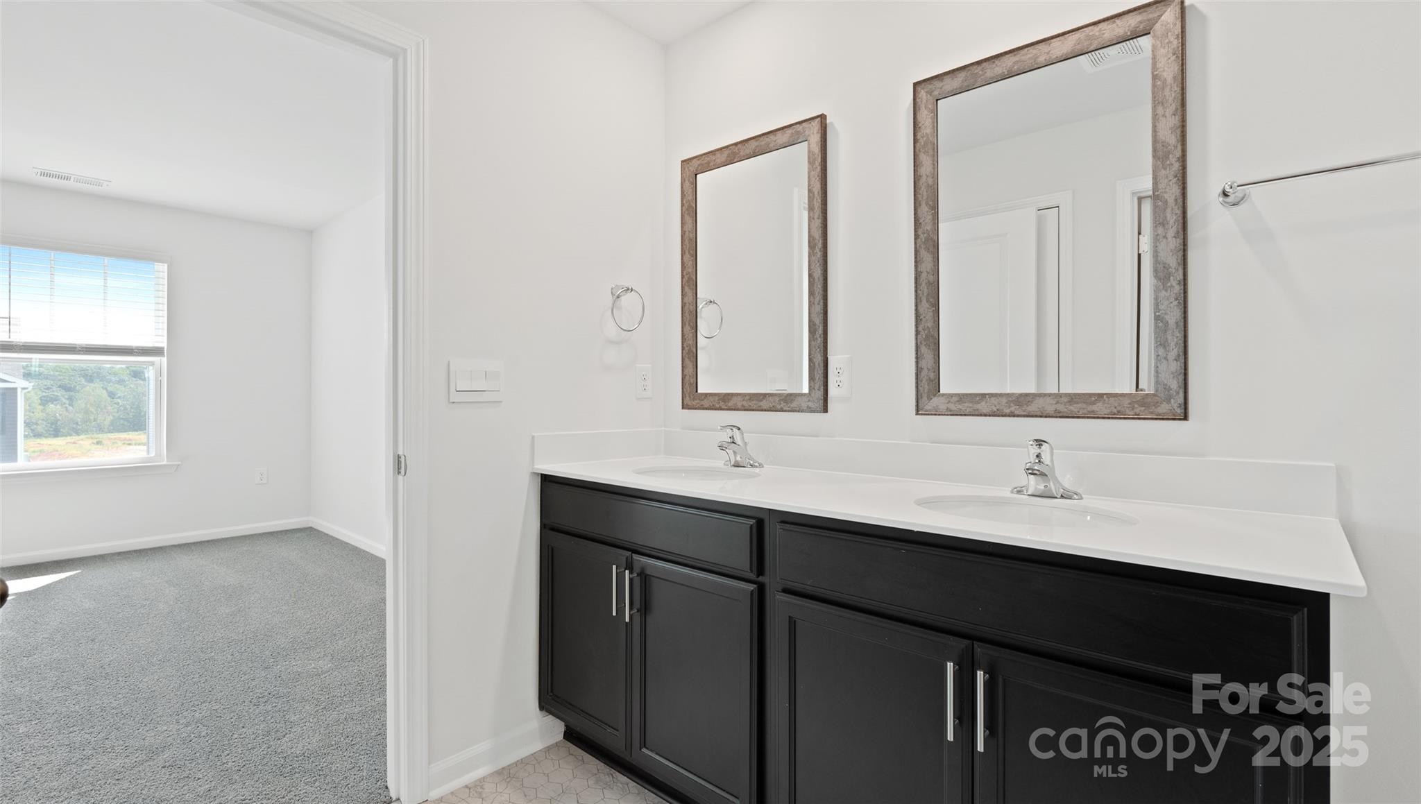 205 Callie River Clyde, NC 28721 - Photo 15 of 20 a bathroom with a sink and a mirror