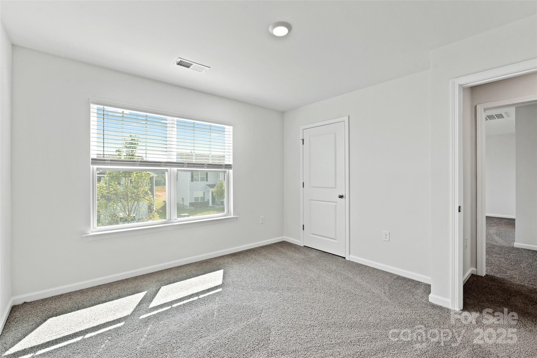 205 Callie River Clyde, NC 28721 - Photo 16 of 20 a view of an empty room with a window