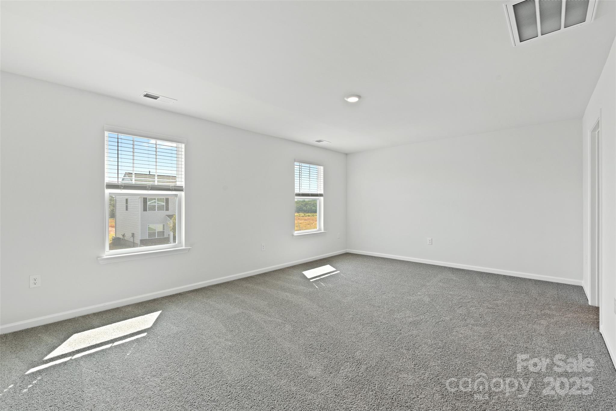 205 Callie River Clyde, NC 28721 - Photo 18 of 20 an empty room with windows